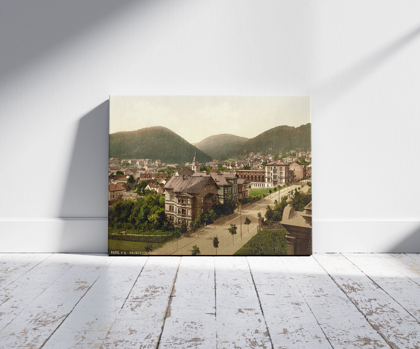 A picture of Friedrichrhoda, from Alexanderstrasse, Thuringia, Germany, a mockup of the print leaning against a wall