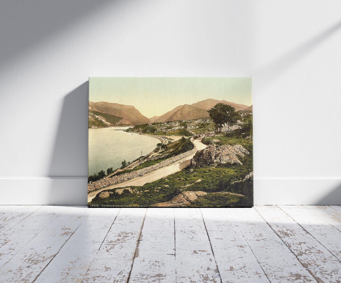 A picture of From Carnarvon road, Snowdon, Wales , a mockup of the print leaning against a wall