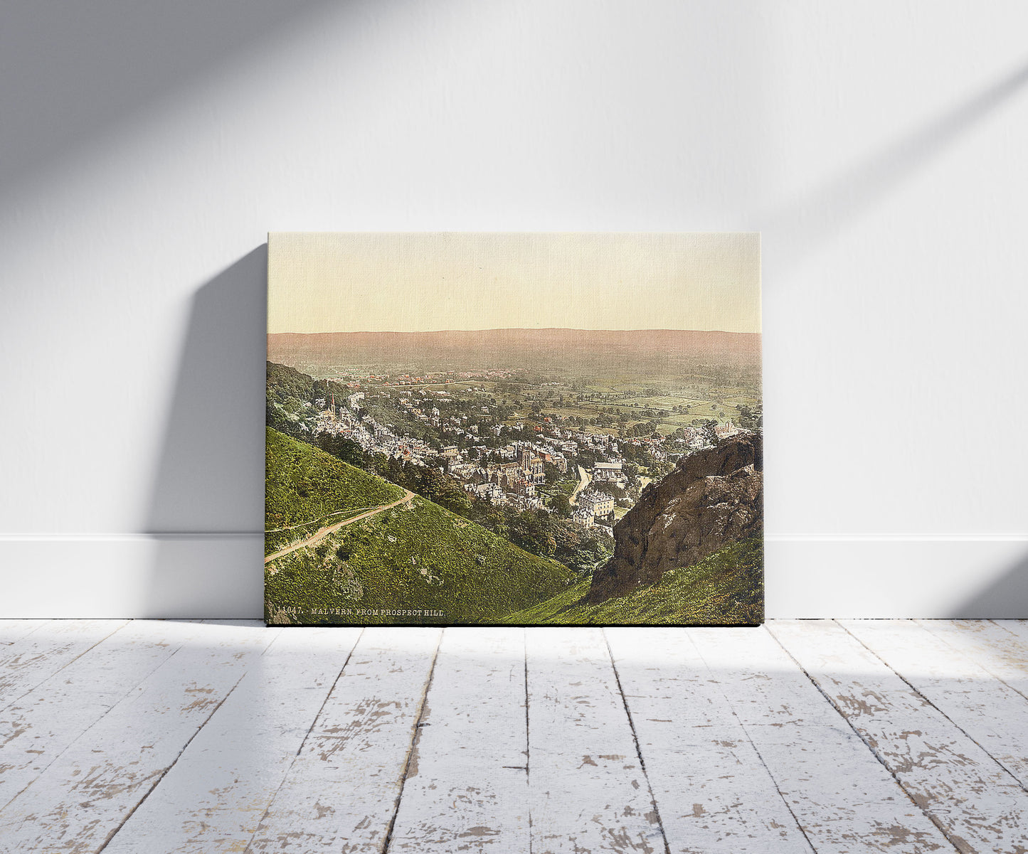 A picture of From Prospect Hill, Malvern, England, a mockup of the print leaning against a wall