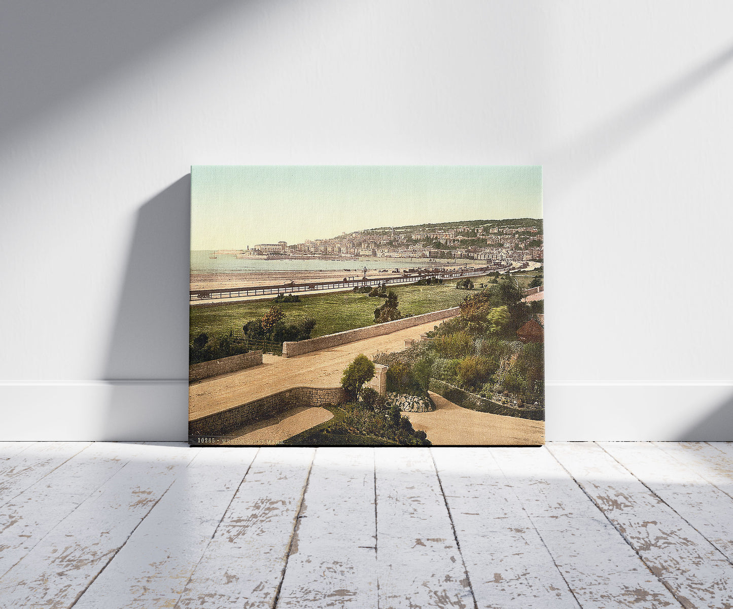 A picture of From south, Weston-super-Mare, England, a mockup of the print leaning against a wall