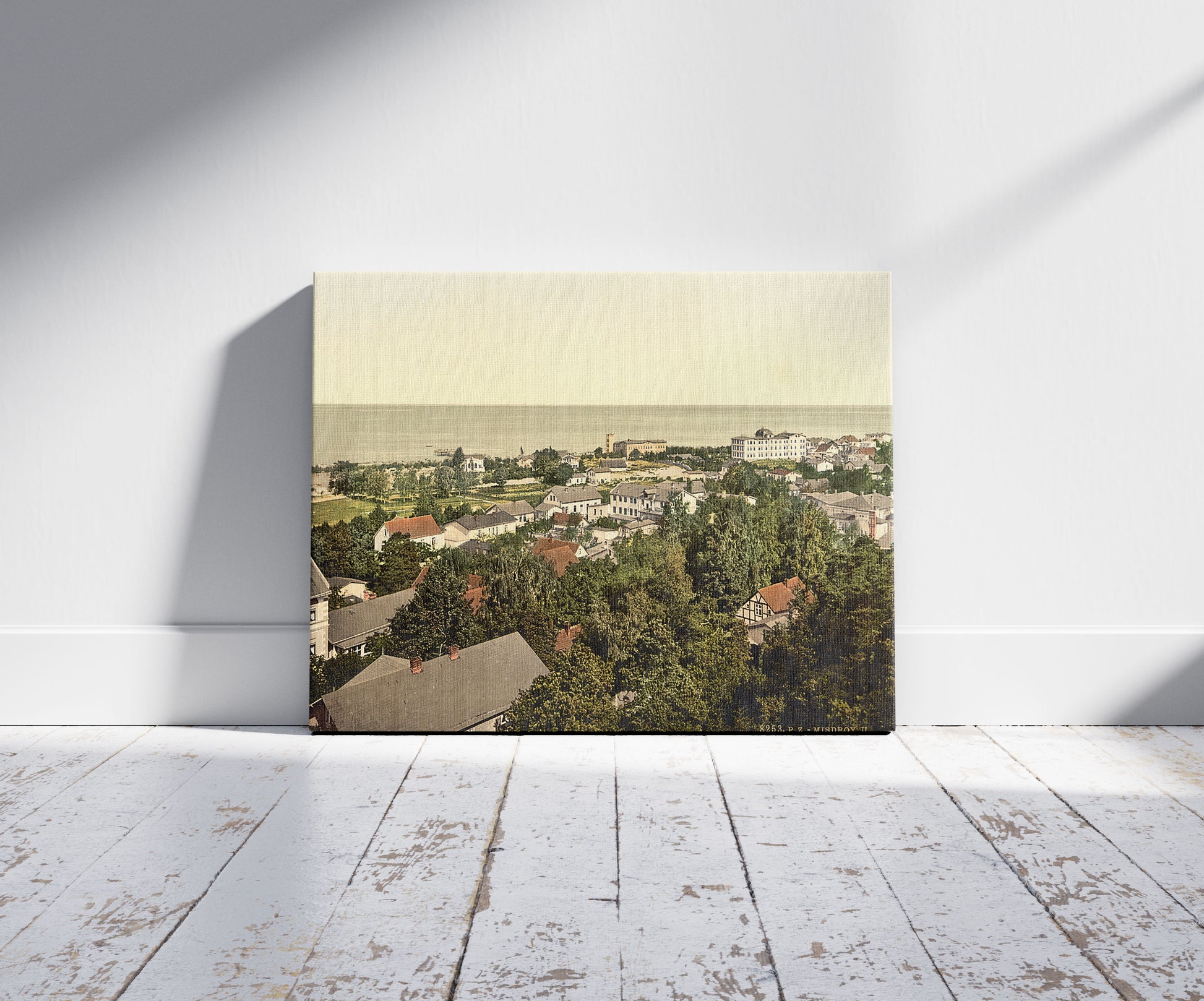 A picture of From the church, Misdroy, Pomerania, Germany  (i.e., Międzyzdroje, Poland), a mockup of the print leaning against a wall