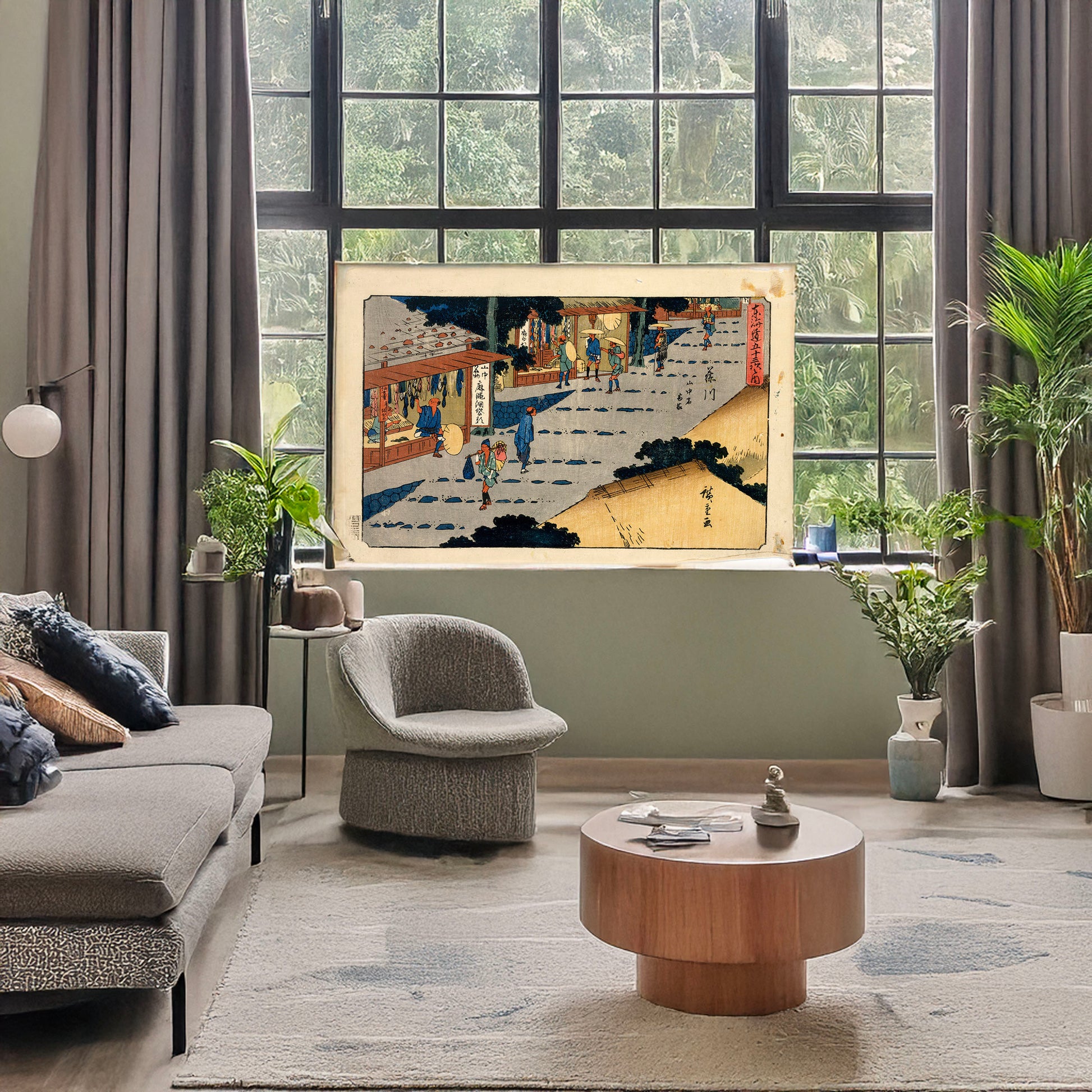 A picture of Fujikawa, a mockup of the print leaning against a wall