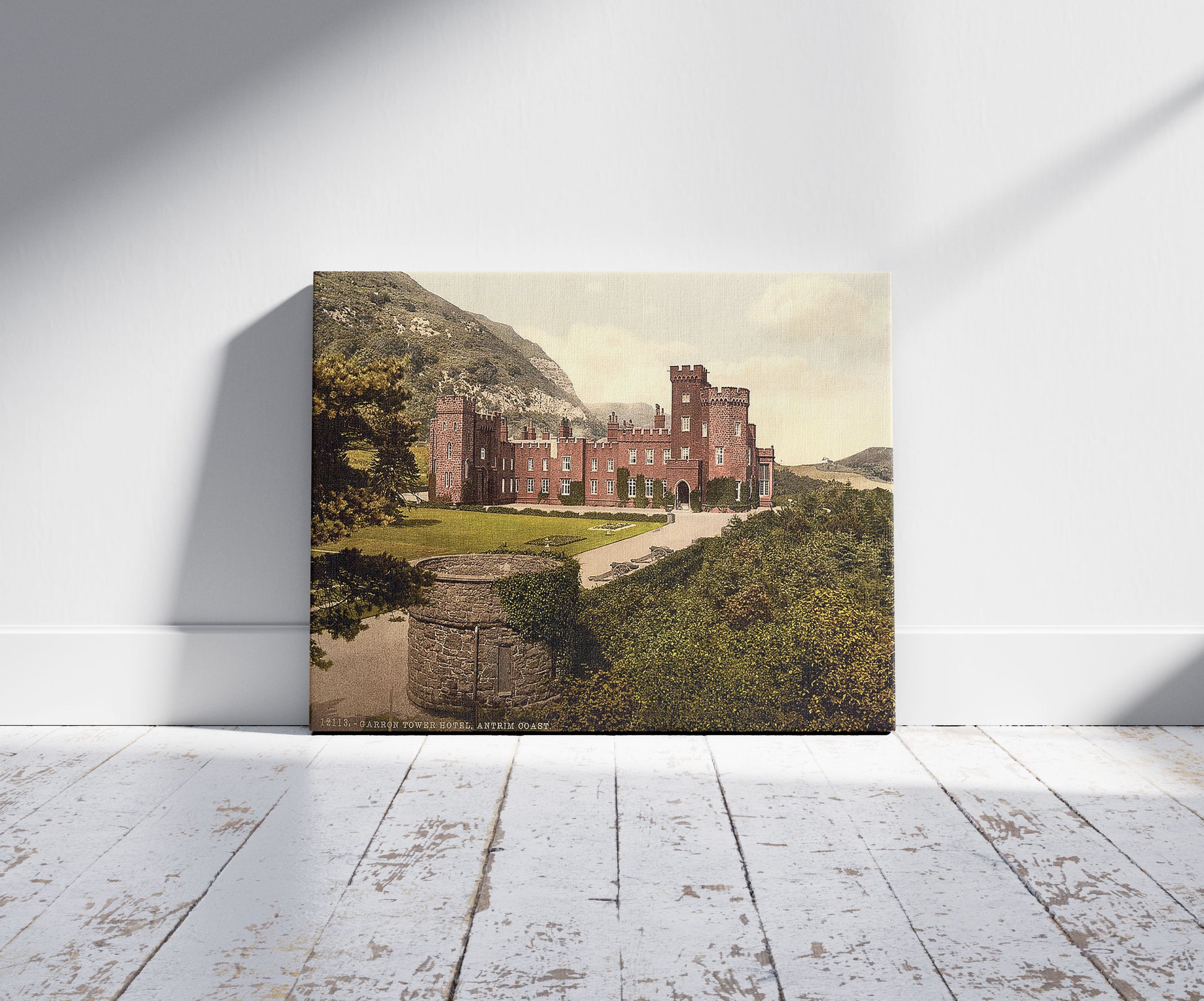 A picture of Garron Tower Hotel. County Antrim, Ireland, a mockup of the print leaning against a wall