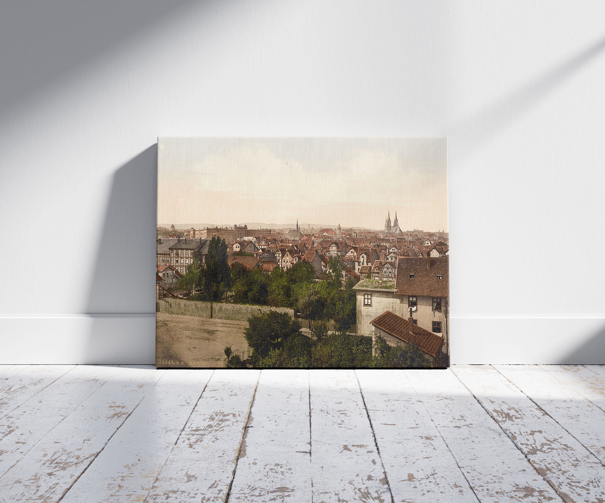 A picture of General view, Cassel (i.e, Kassel), Hesse-Nassau, Germany, a mockup of the print leaning against a wall