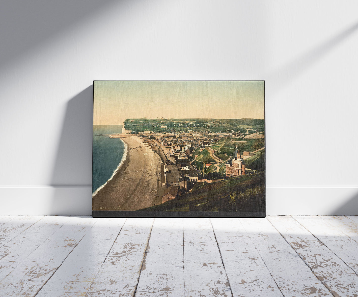 A picture of General view, Fecamp, France, a mockup of the print leaning against a wall
