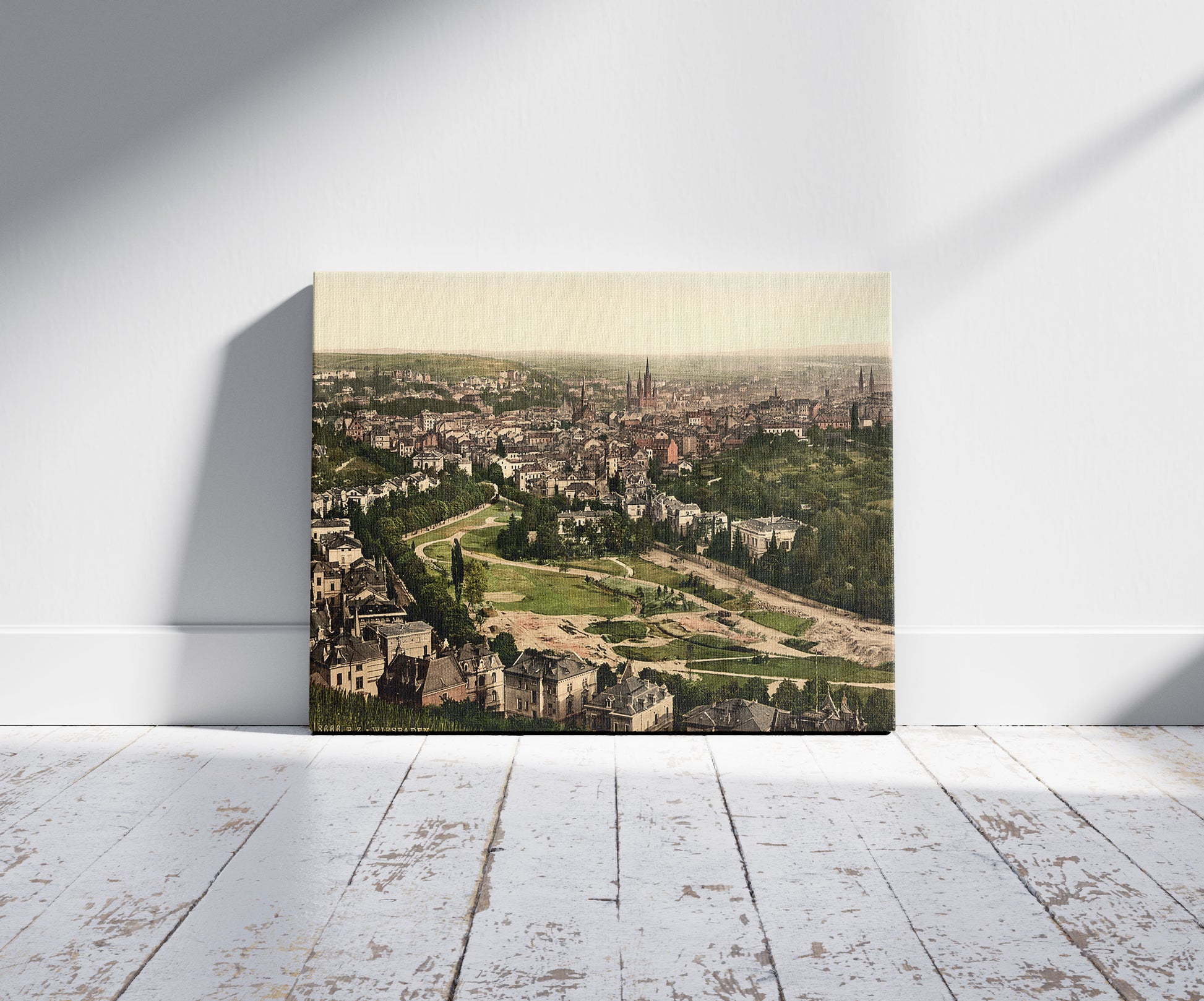 A picture of General view from Neroberg, Wiesbaden, Hesse-Nassau, Germany, a mockup of the print leaning against a wall