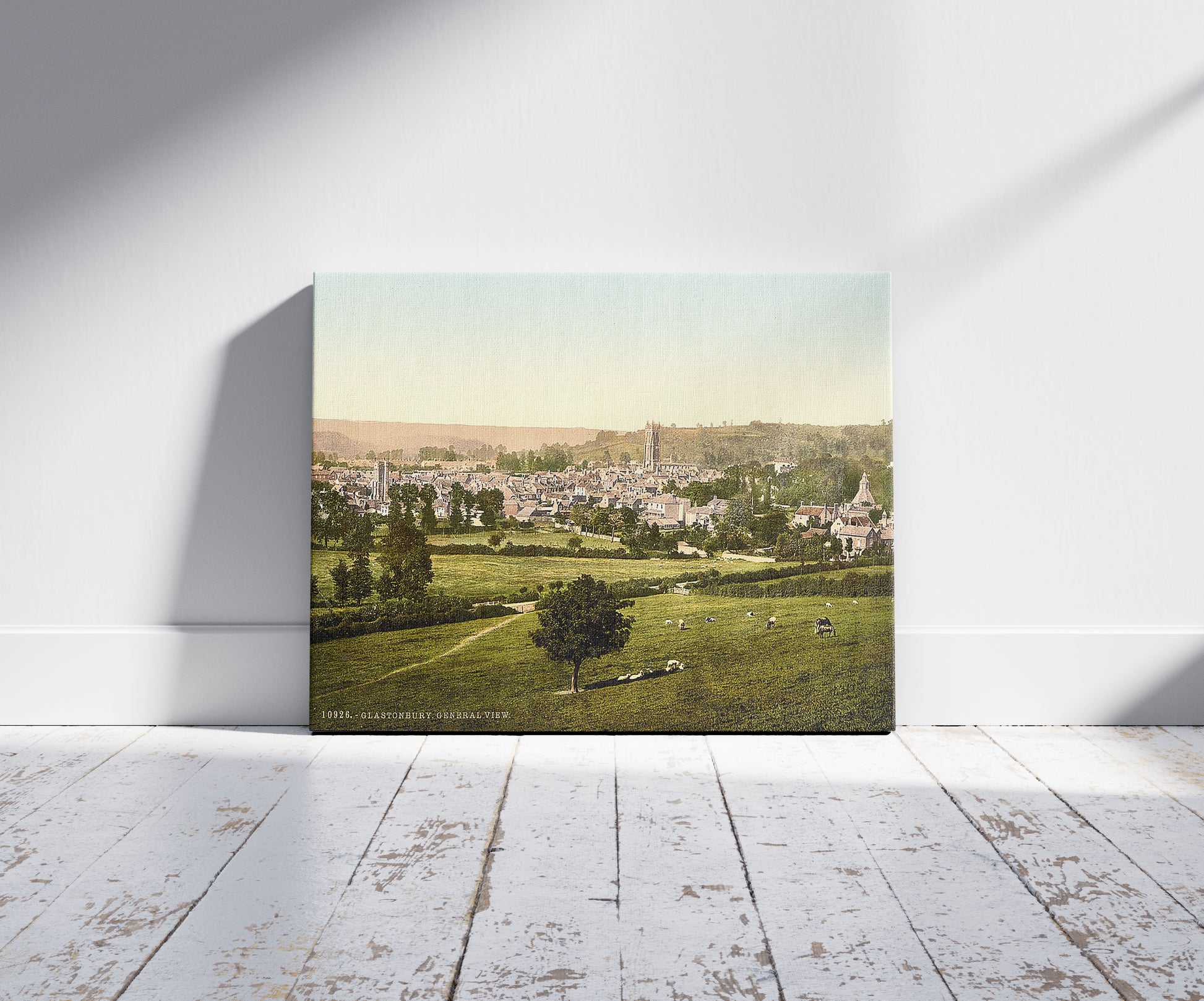 A picture of General view, Glastonbury, England, a mockup of the print leaning against a wall