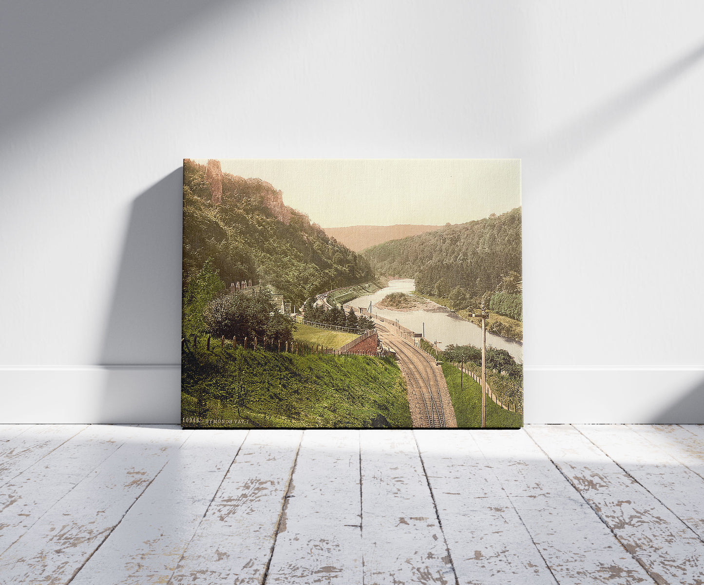 A picture of General view, I., Symonds Yat, England, a mockup of the print leaning against a wall