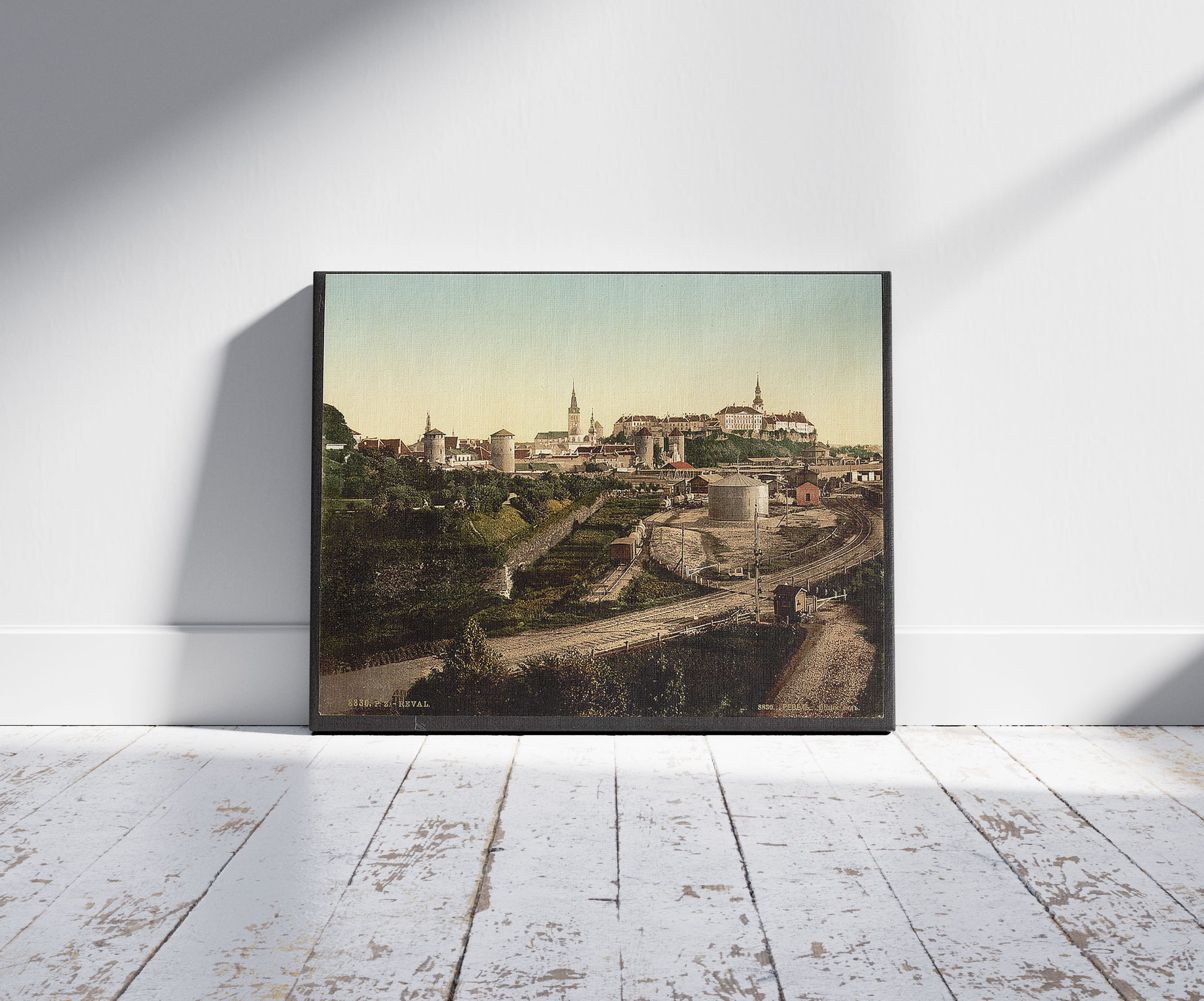 A picture of General view, Reval, a mockup of the print leaning against a wall