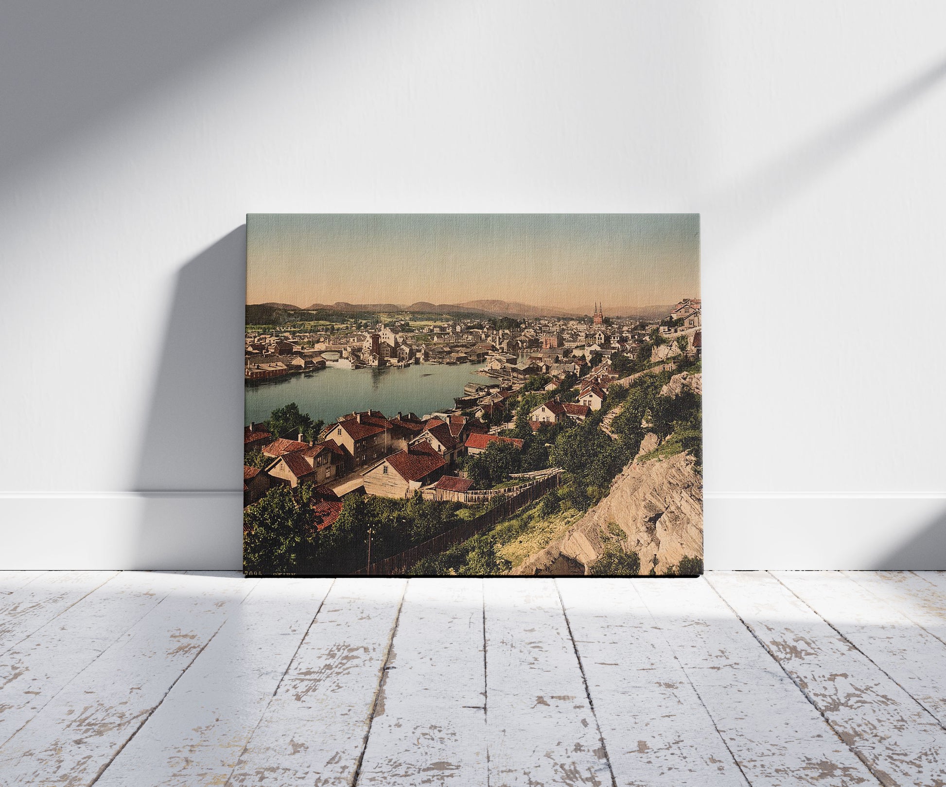 A picture of General view, Skien, Norway, a mockup of the print leaning against a wall