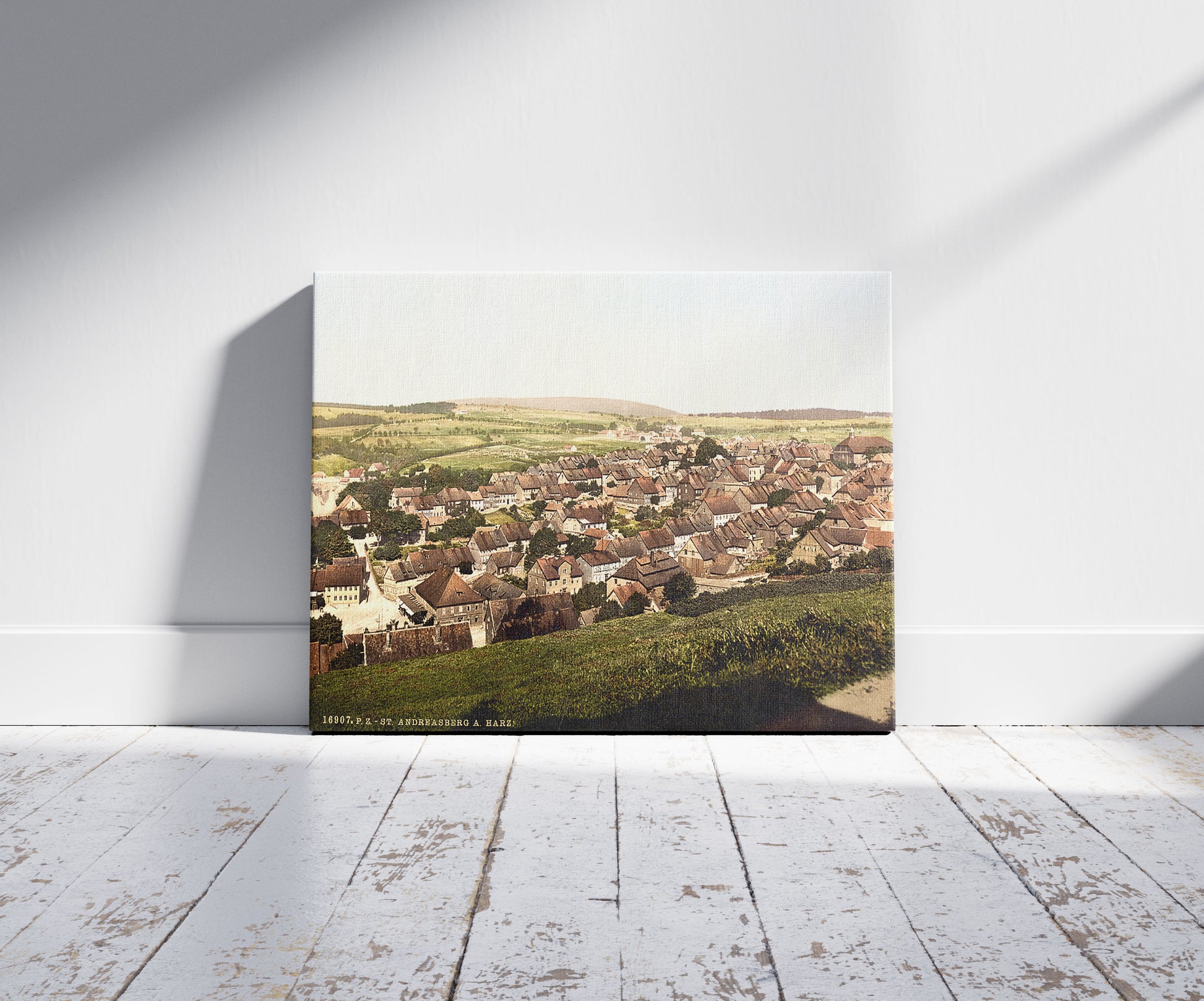 A picture of General view, St. Andreasburg, Hartz, Germany, a mockup of the print leaning against a wall