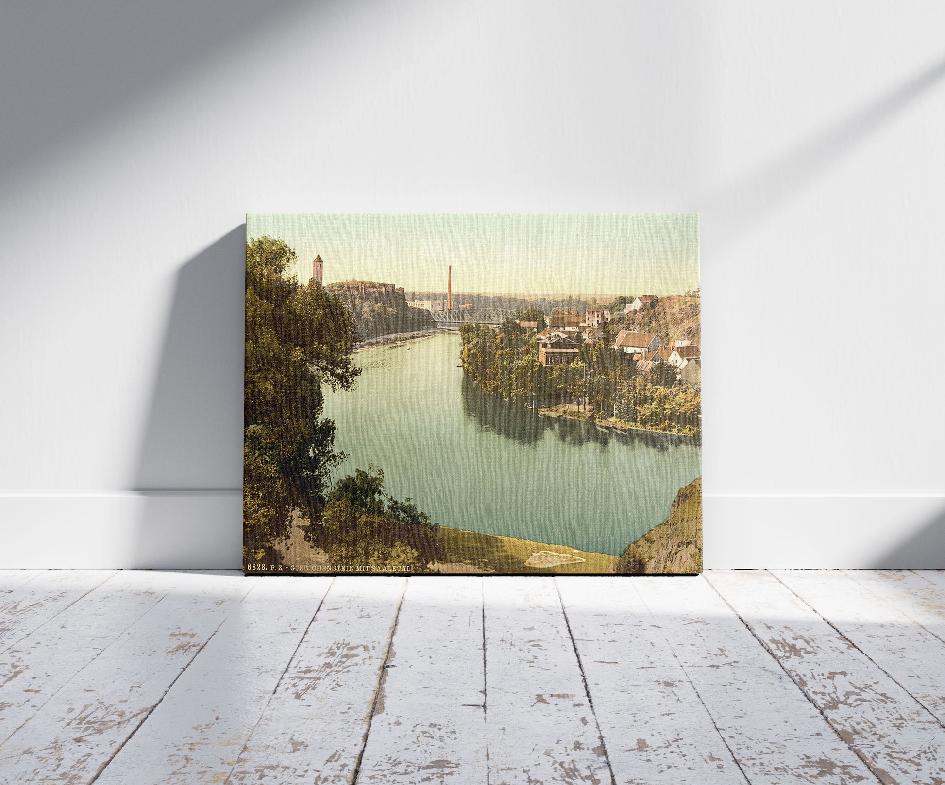 A picture of Giebichenstein Ruins and Valley of the Saale, Halle, German Saxony, Germany, a mockup of the print leaning against a wall
