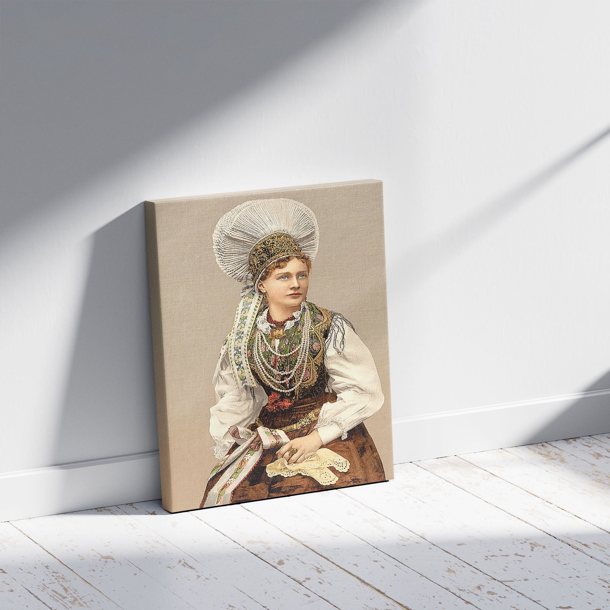 A picture of Girls in native costume, Carniola, Austro-Hungary, a mockup of the print leaning against a wall