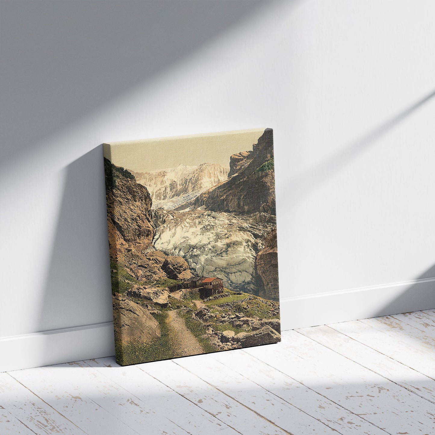 A picture of Glacier and Bäregg Inn, Grindelwald, Bernese Oberland, Switzerland, a mockup of the print leaning against a wall