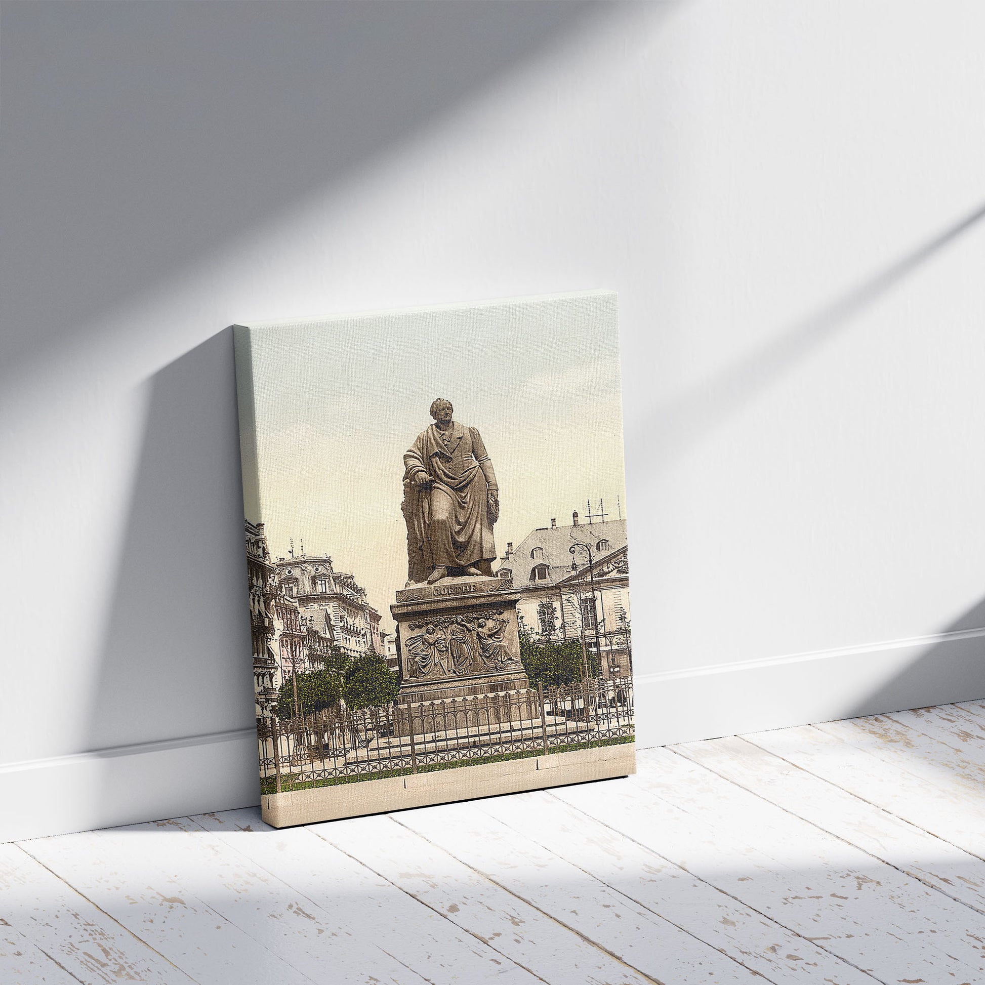 A picture of Goethe's Monument, Frankfort on Main (i.e. Frankfurt am Main), Germany, a mockup of the print leaning against a wall