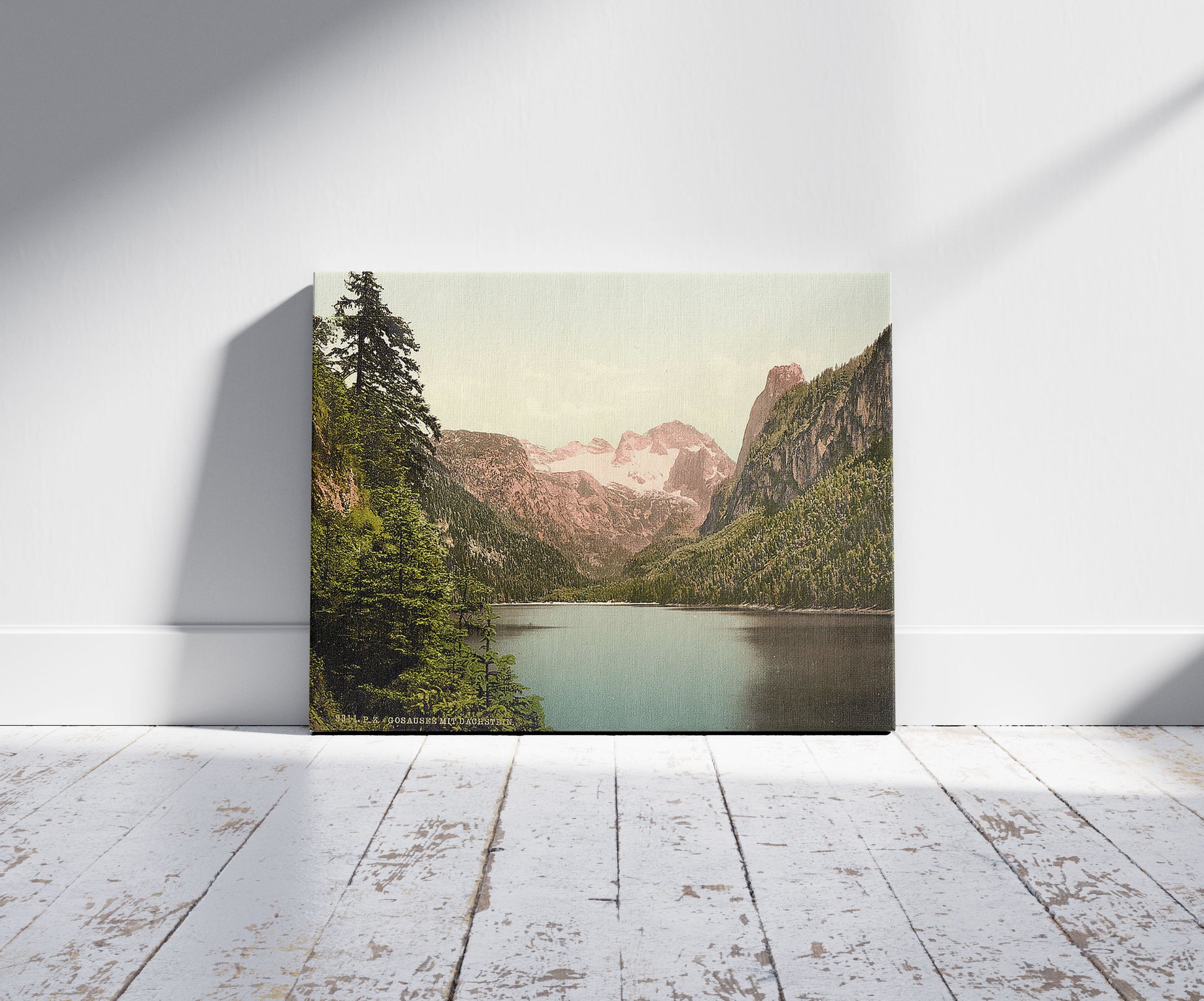 A picture of Gosausee and Dachstein, Upper Austria, Austro-Hungary, a mockup of the print leaning against a wall