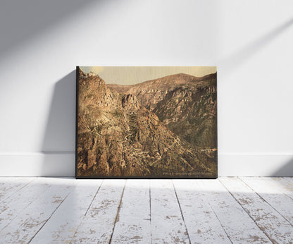 A picture of Gourdon, Grasse, France, a mockup of the print leaning against a wall