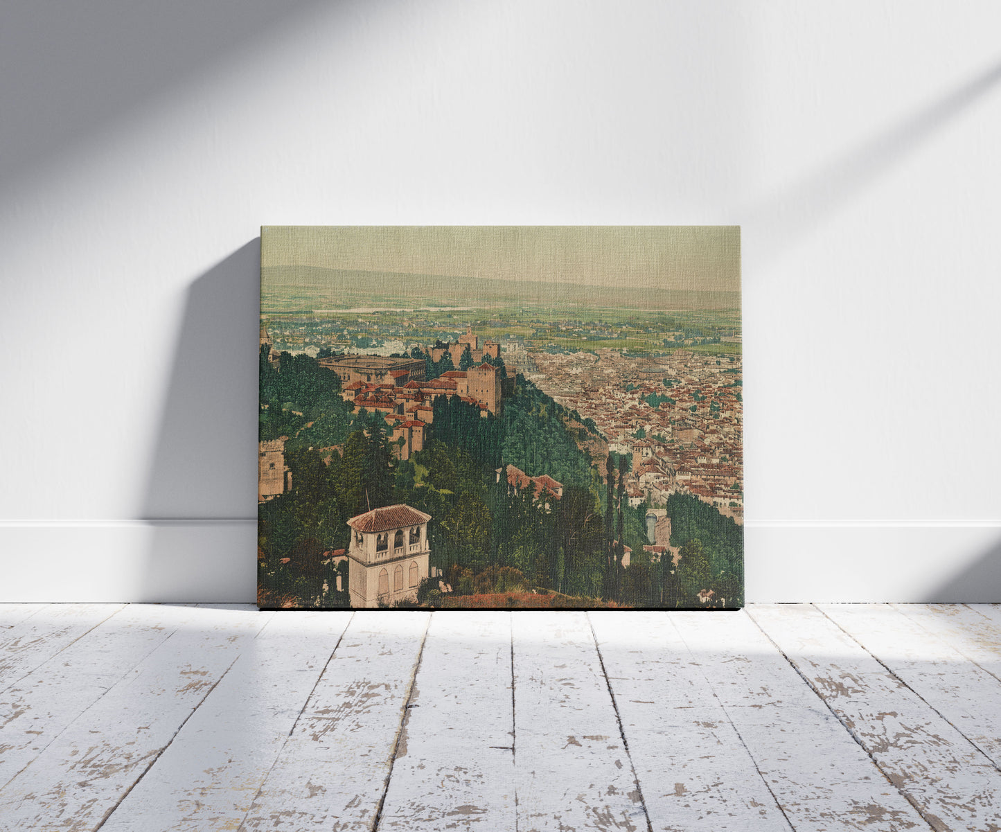 A picture of Granada. Vista general de la Alhambra y Grandada desde la Silla del Moro, a mockup of the print leaning against a wall