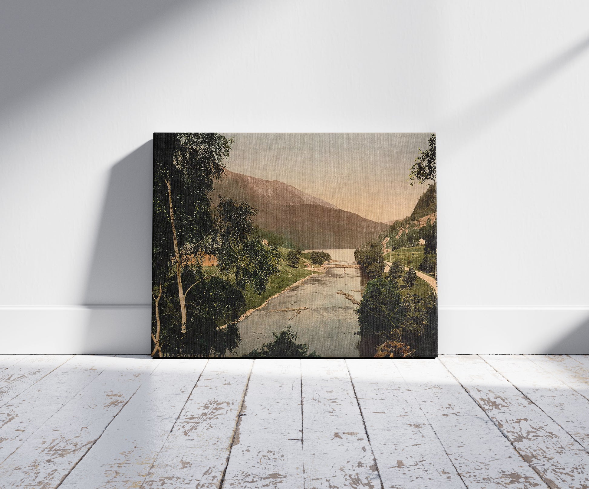 A picture of Graven Lake, Eide, Hardanger Fjord, Norway, a mockup of the print leaning against a wall