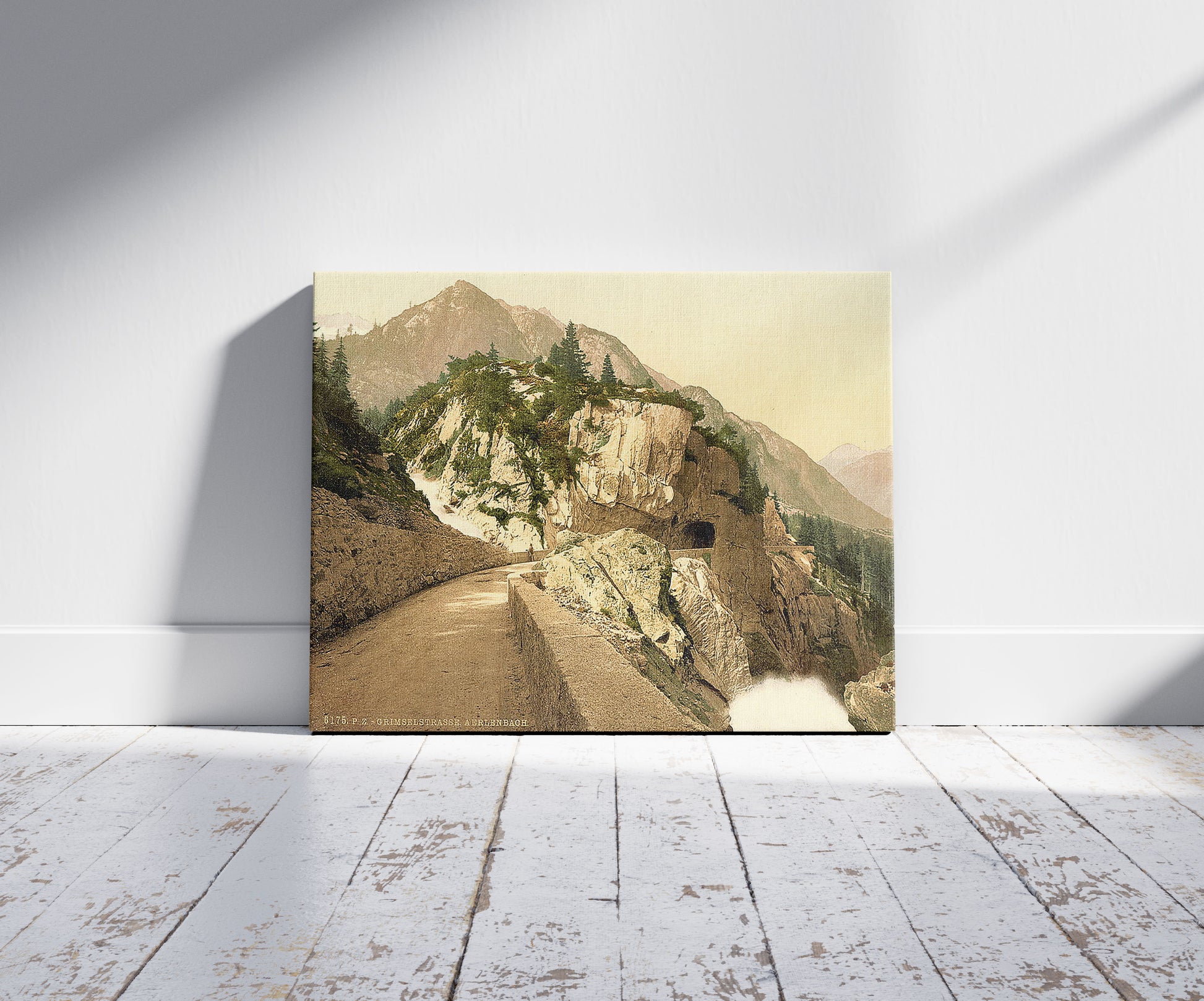 A picture of Grimselstrasse, Aerlenbach, Bernese Oberland, Switzerland, a mockup of the print leaning against a wall
