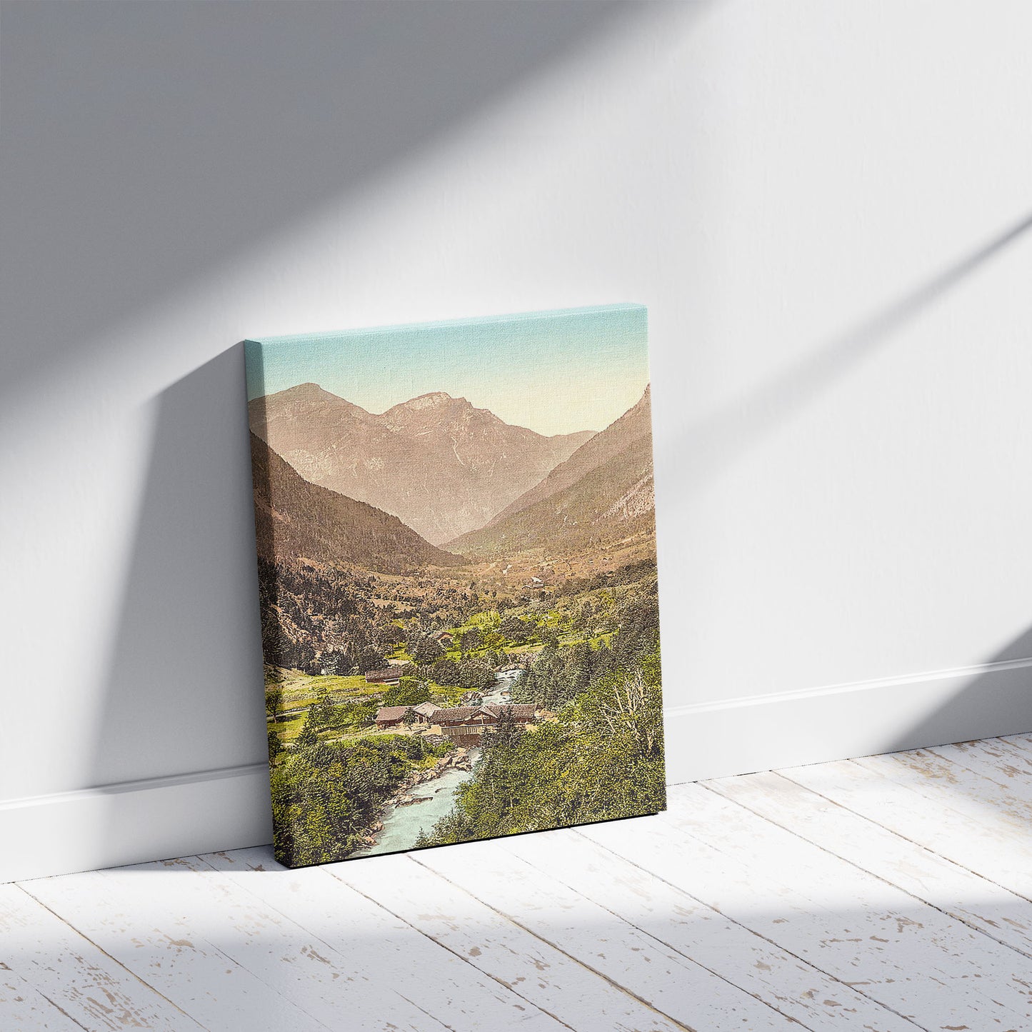 A picture of Grindelwald, road from Zwiellutschine, Bernese Oberland, Switzerland, a mockup of the print leaning against a wall
