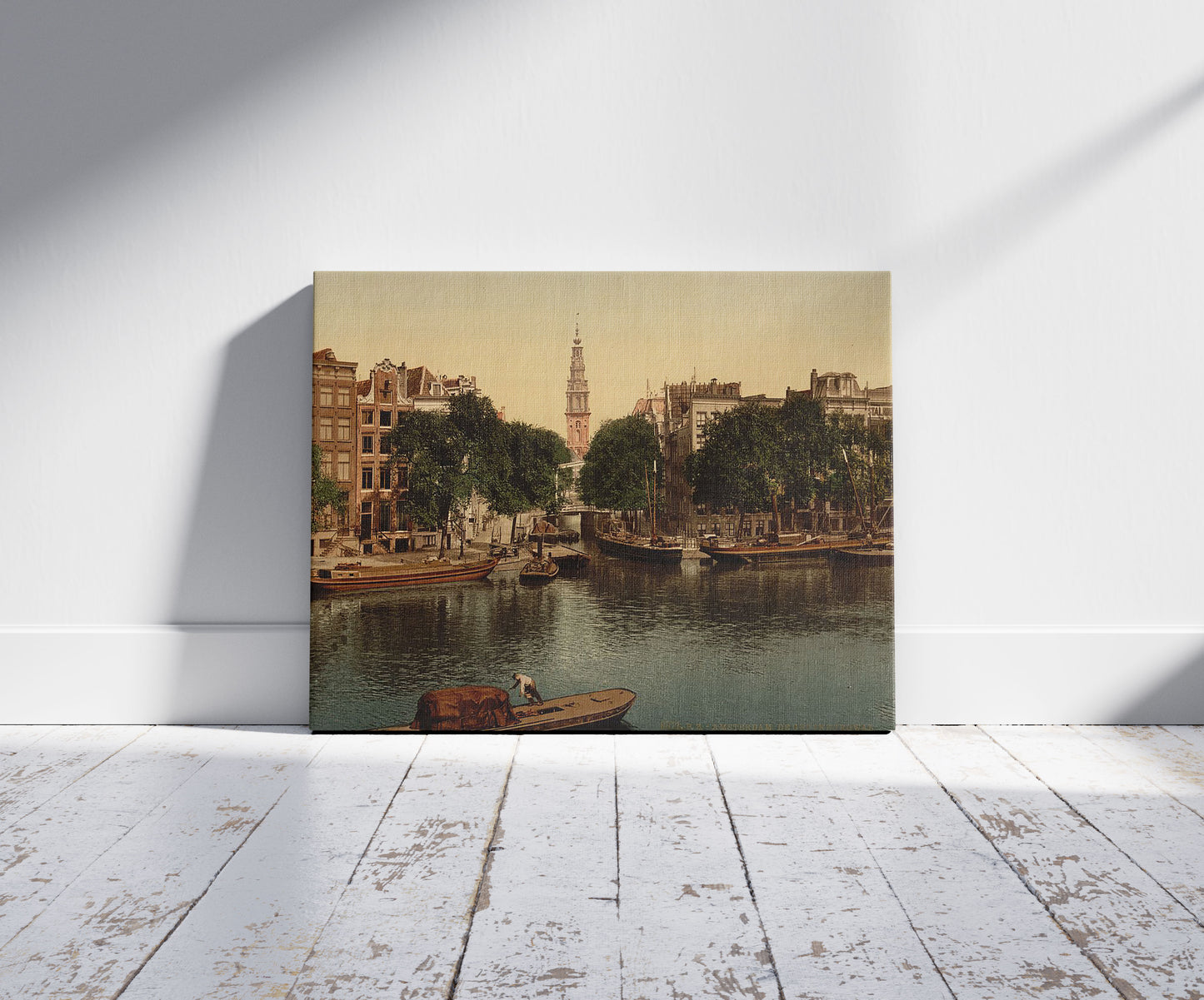 A picture of Groen Burgwal (canal), Amsterdam, Holland, a mockup of the print leaning against a wall