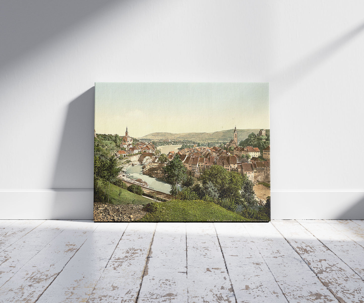 A picture of Gross and Klein Laufenburg, Aargau, Switzerland, a mockup of the print leaning against a wall