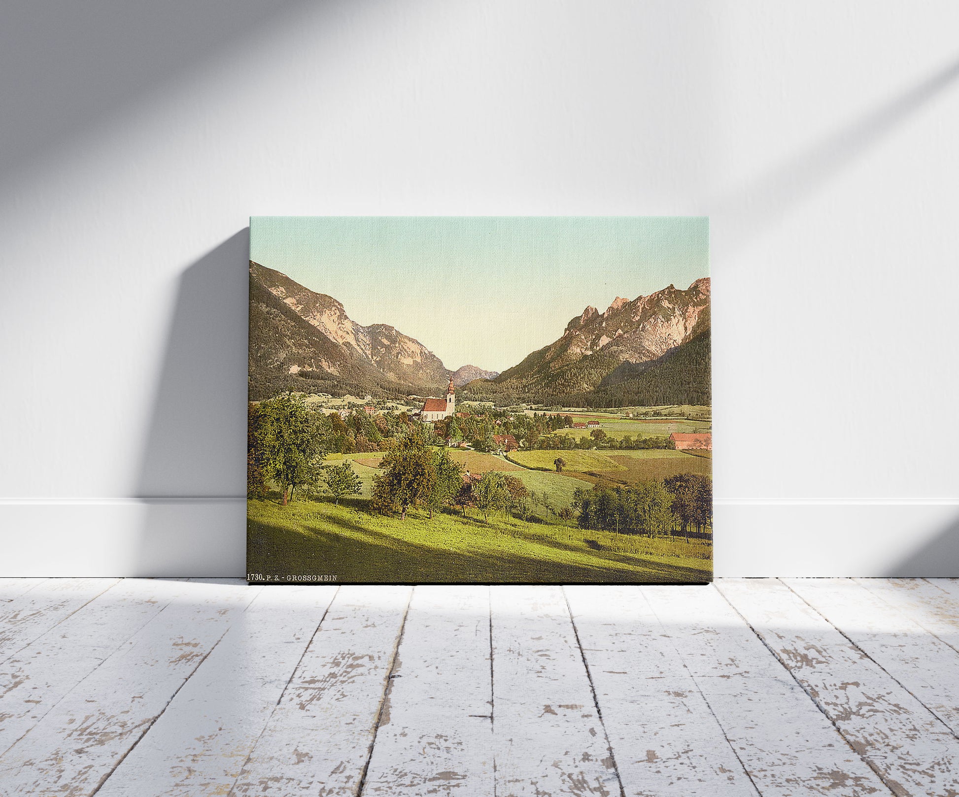 A picture of Grossgmein (i.e., Gross-Gmain), near the baths of Reichenhall, Salzburg, Austro-Hungary, a mockup of the print leaning against a wall