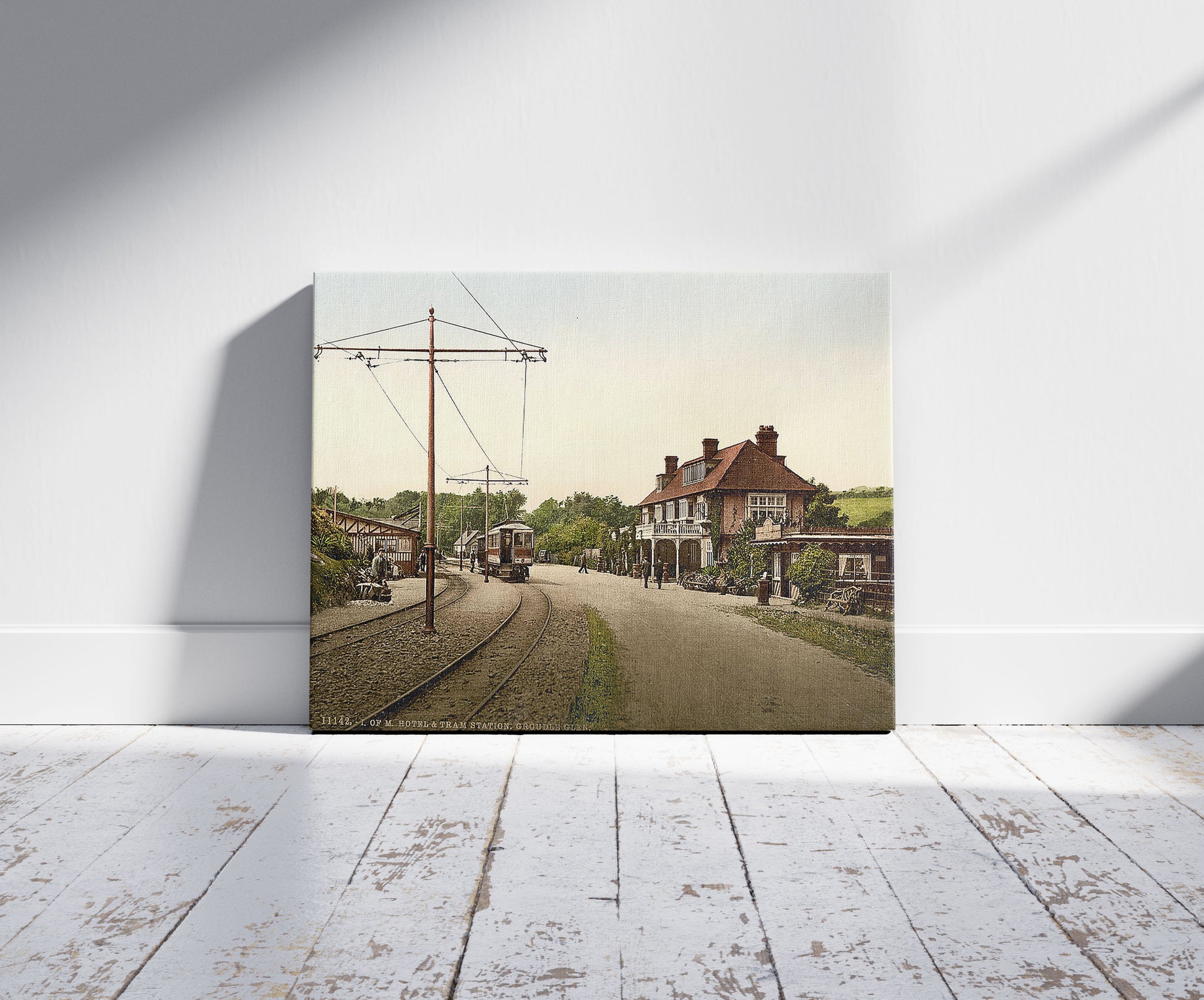 A picture of Groudle Glen Hotel and tram station, Isle of Man, a mockup of the print leaning against a wall