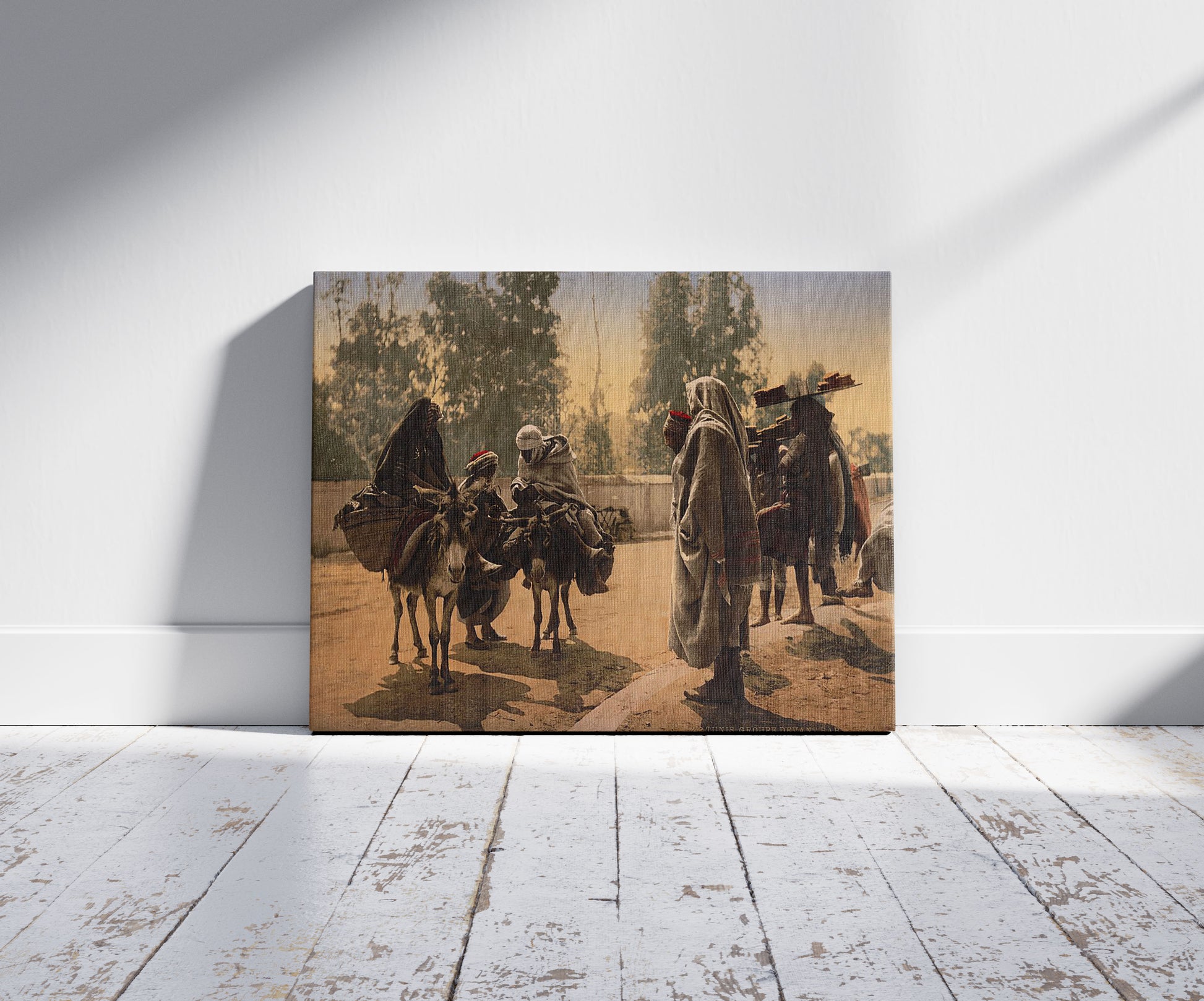 A picture of Group before Bab Aleona, Tunis, Tunisia, a mockup of the print leaning against a wall