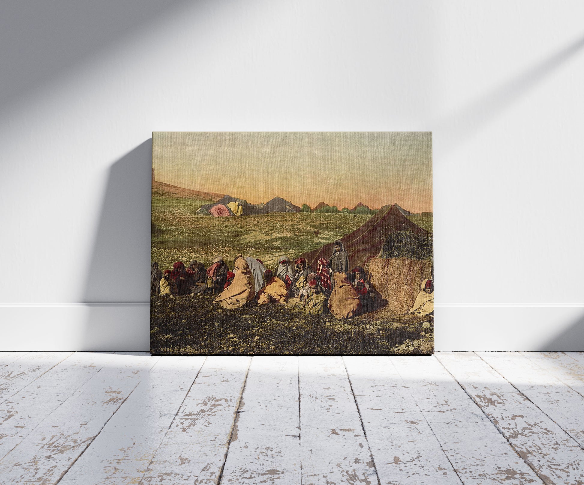 A picture of Group of wandering Arabs, Tunis, Tunisia, a mockup of the print leaning against a wall