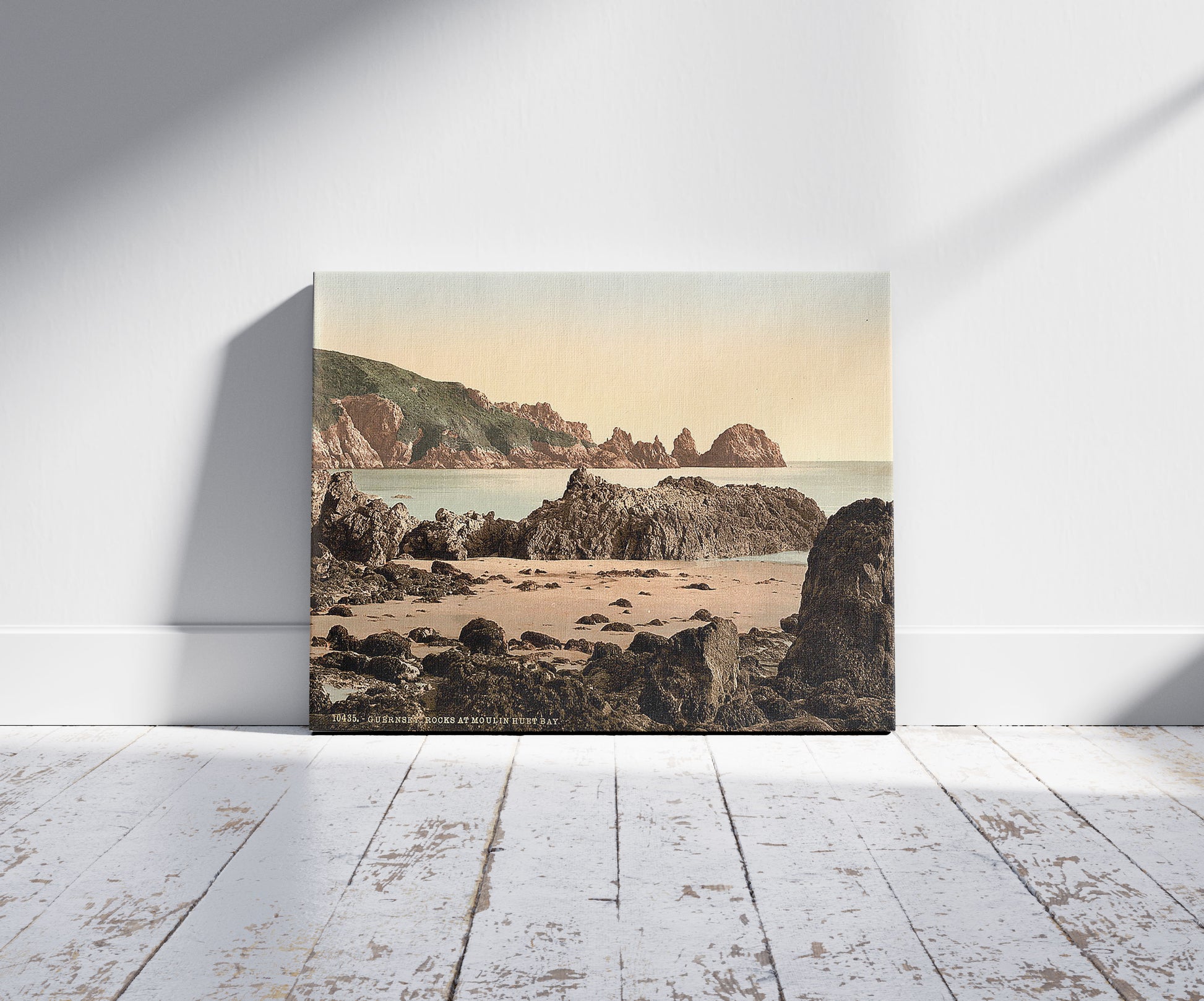 A picture of Guernsey, Moulin Huet Bay, I, Channel Islands, a mockup of the print leaning against a wall