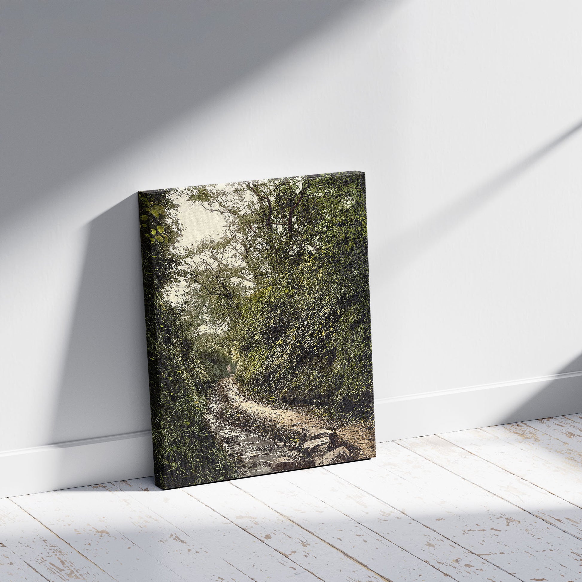 A picture of Guernsey, water lane, Moulin Huet, Channel Islands, a mockup of the print leaning against a wall