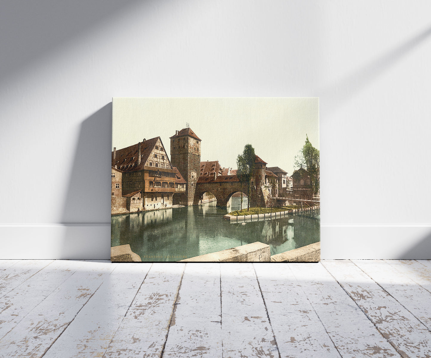 A picture of Hangman Bridge, Nuremberg, Bavaria, Germany, a mockup of the print leaning against a wall