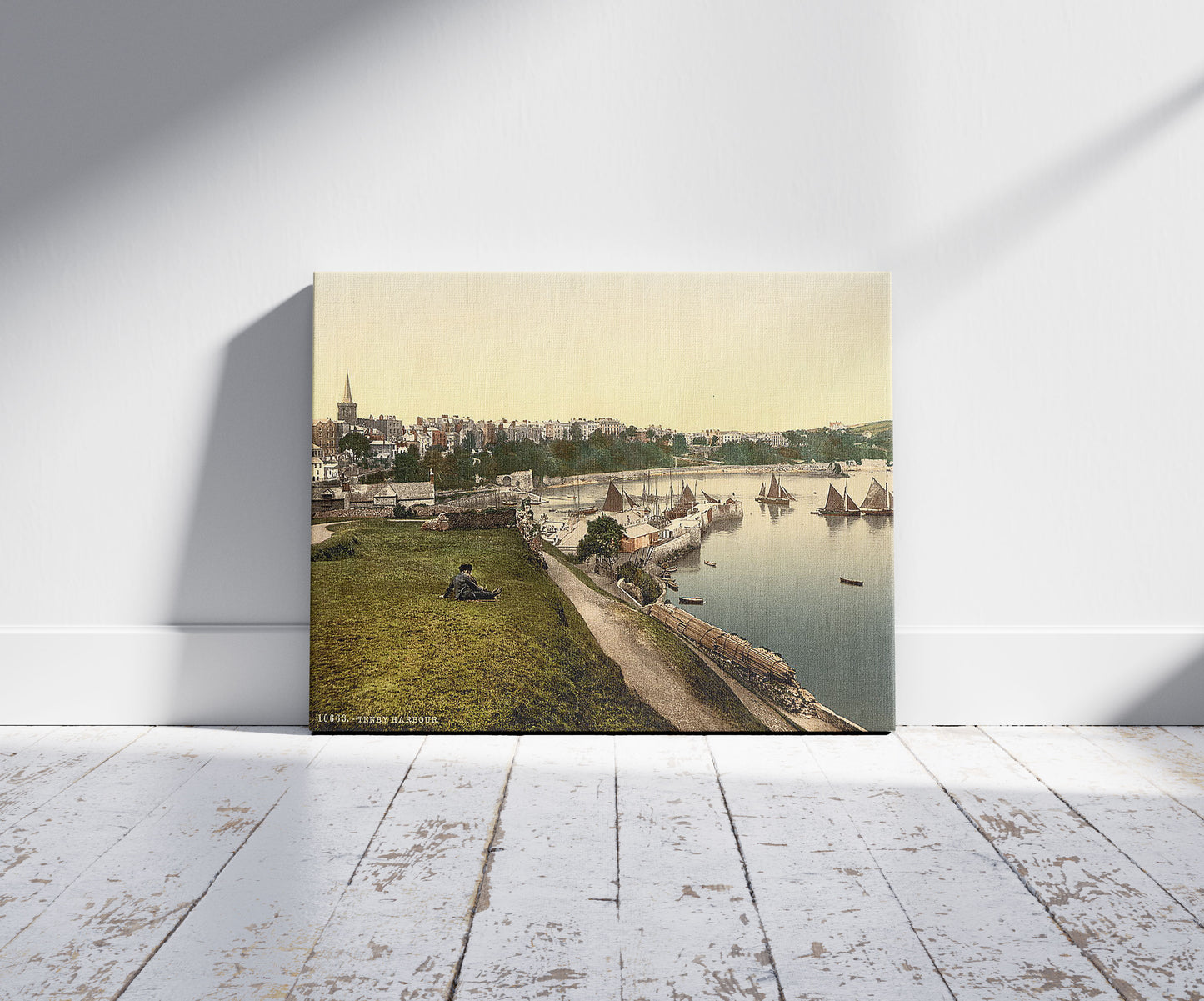 A picture of Harbor, Tenby, Wales, a mockup of the print leaning against a wall