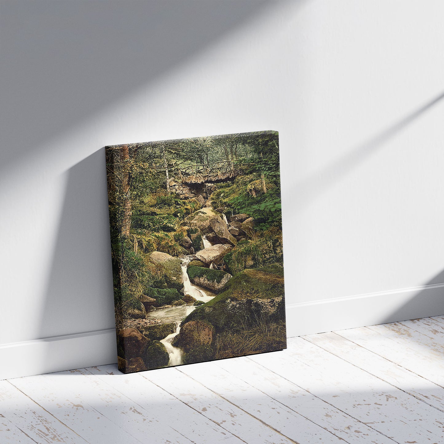 A picture of Heber's Ghyll, Ilkley, England, a mockup of the print leaning against a wall