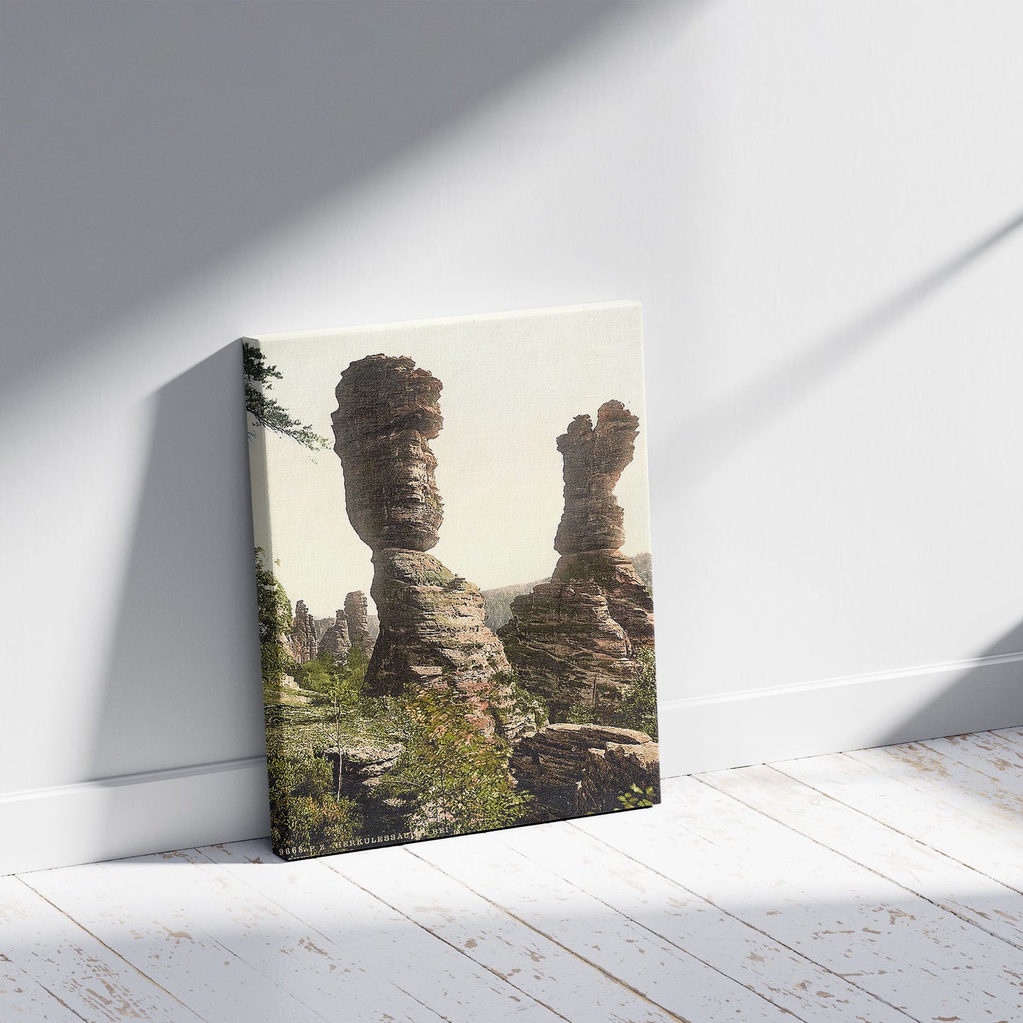 A picture of Hercules Pillar, Bad Schweizermuhle, Saxony, Germany, a mockup of the print leaning against a wall