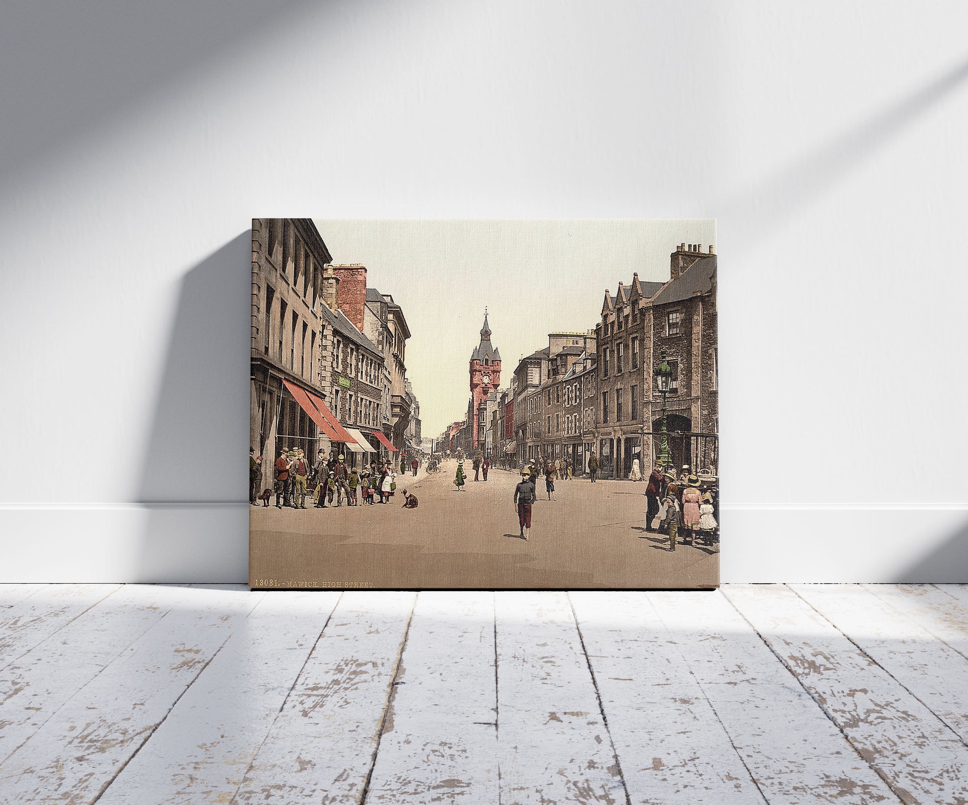 A picture of High Street, Hawick, Scotland, a mockup of the print leaning against a wall