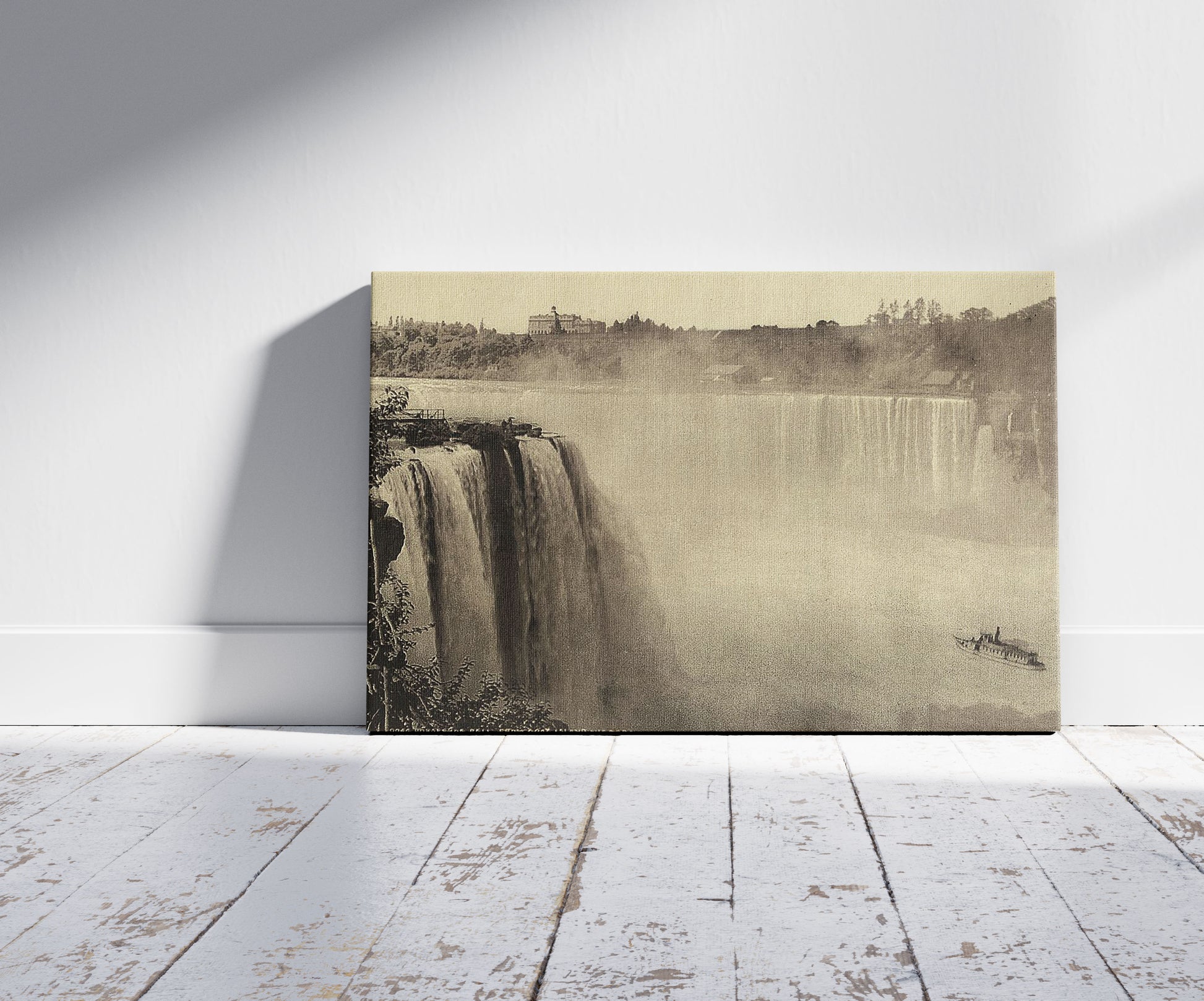 A picture of Horseshoe Fall from Goat Island, Niagara, a mockup of the print leaning against a wall