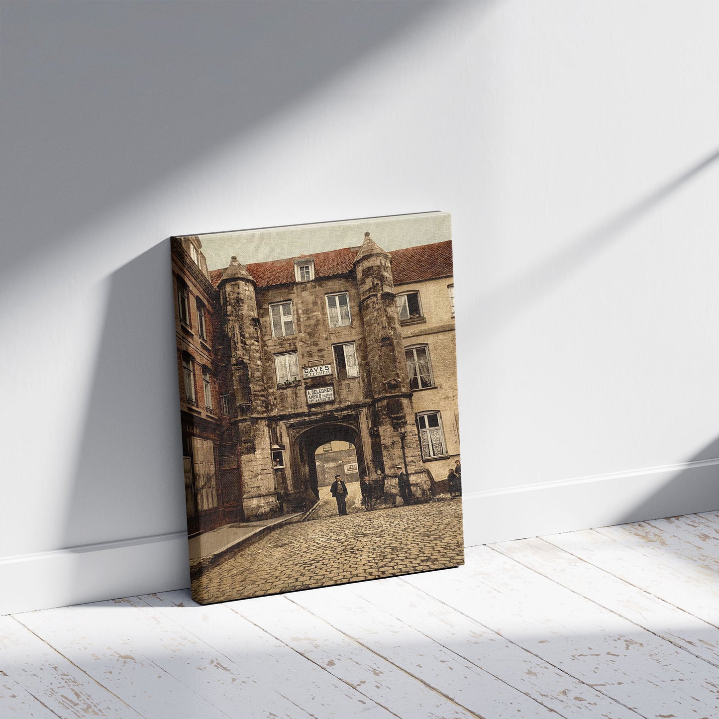 A picture of Hotel des Guises, Calais, France, a mockup of the print leaning against a wall