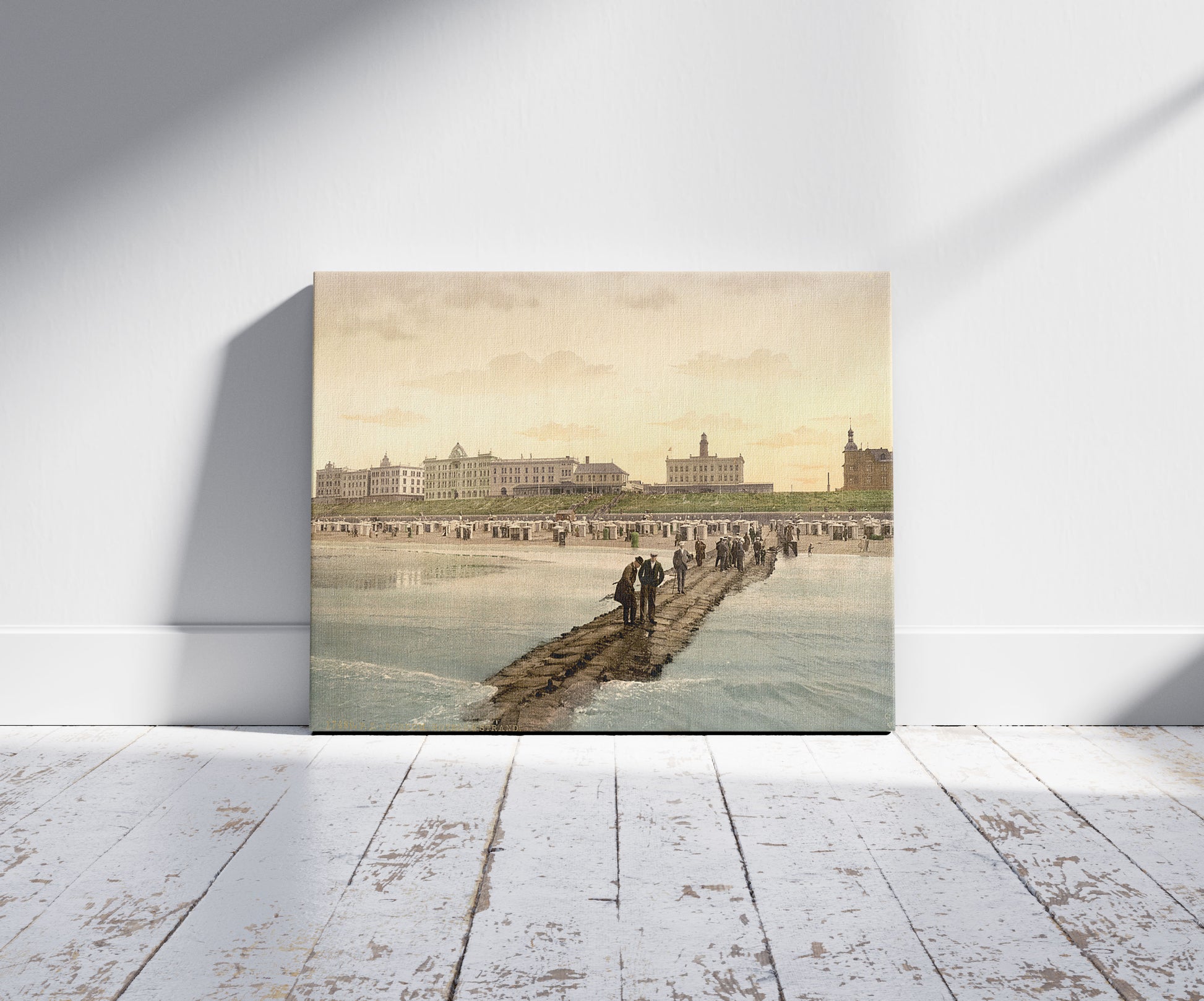 A picture of Hotels and beach, Borkum, Schleswig-Holstein, Germany, a mockup of the print leaning against a wall