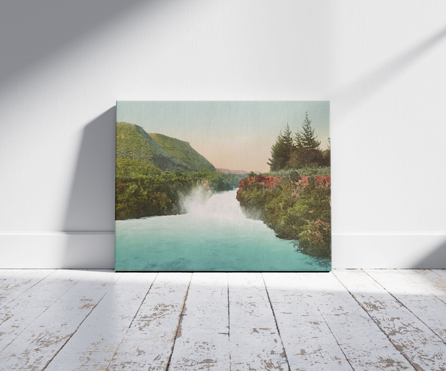 A picture of Huka Falls. NR Taupo Waikato River, a mockup of the print leaning against a wall