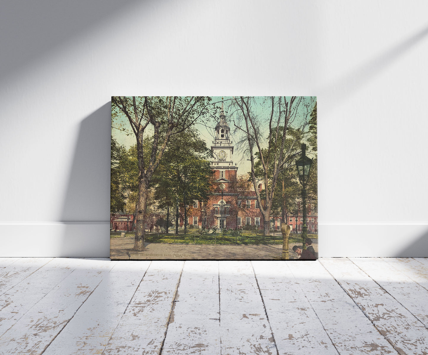 A picture of Independence Hall, Philadelphia, a mockup of the print leaning against a wall