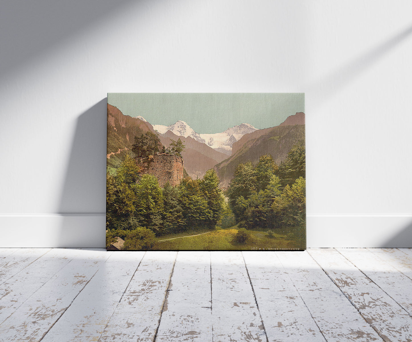 A picture of Interlaken, the Ruins of Unspunnen, Bernese Oberland, Switzerland, a mockup of the print leaning against a wall