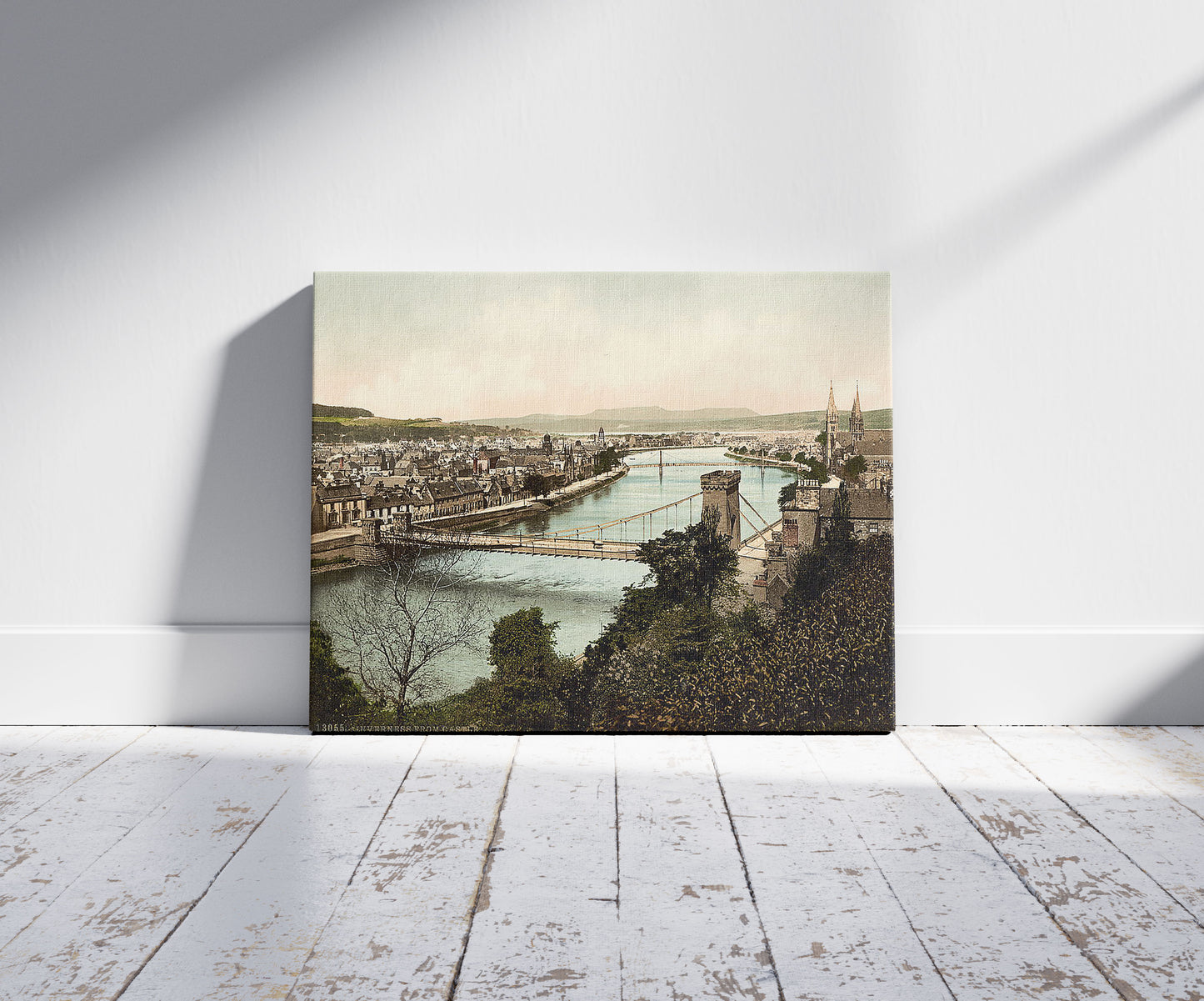 A picture of Inverness from castle, Scotland, a mockup of the print leaning against a wall