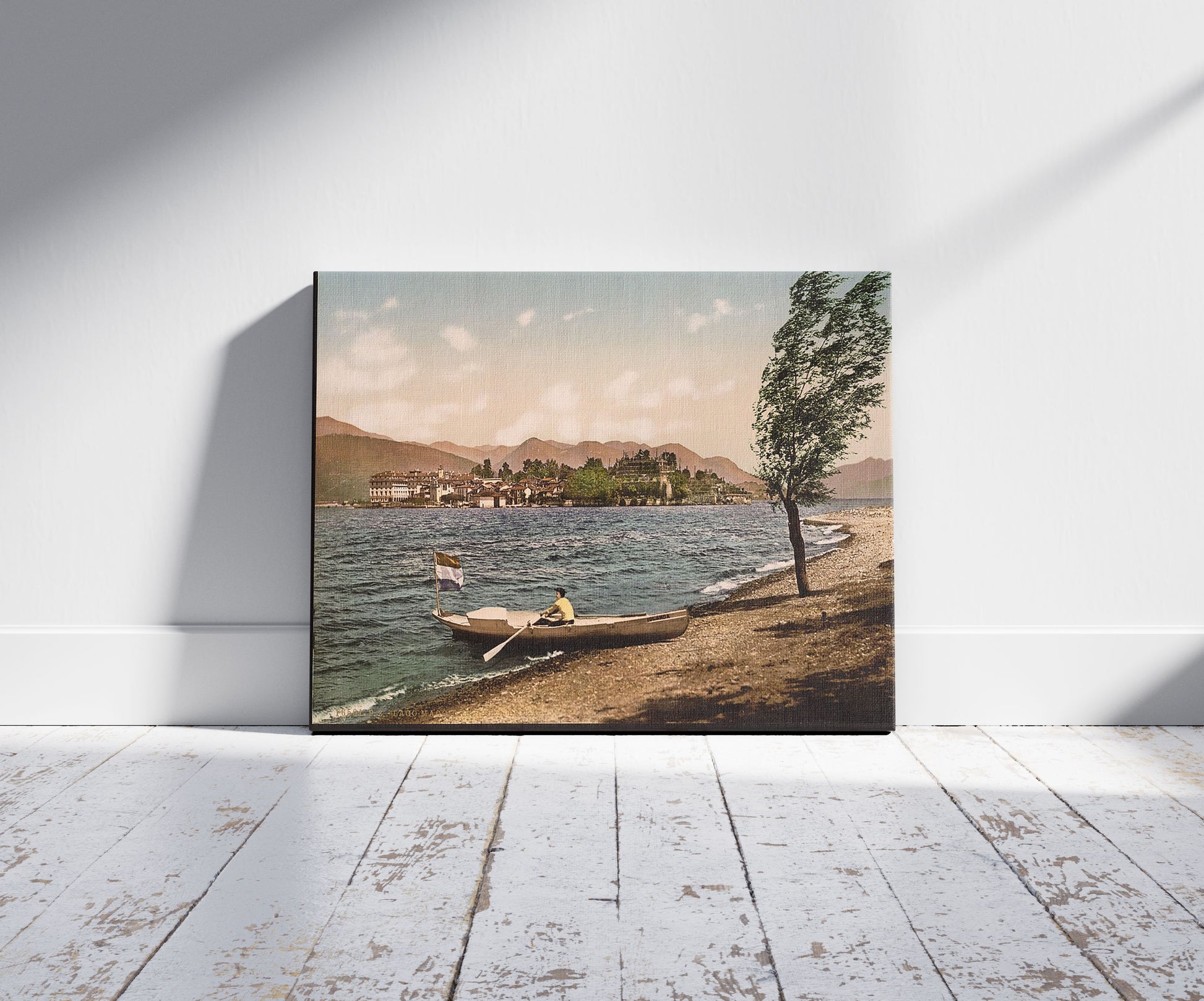 A picture of Isola Bella, Lake Maggiore, Italy, a mockup of the print leaning against a wall