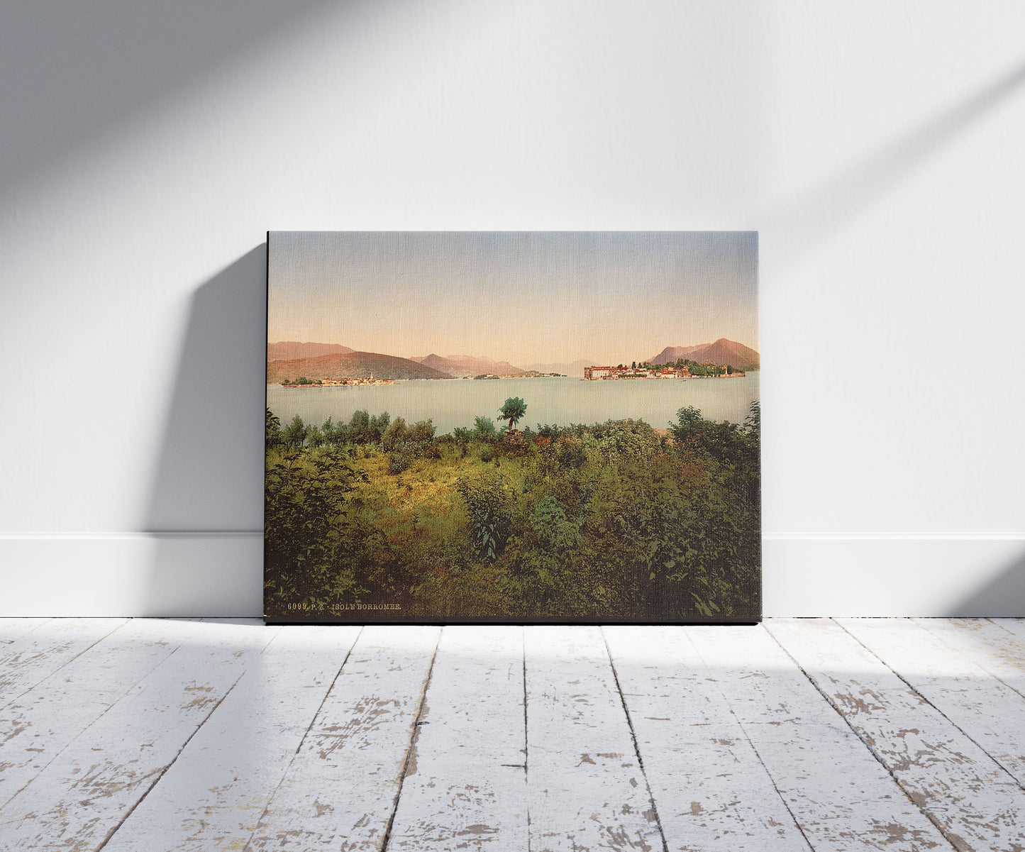 A picture of Isola Borrome (i.e. Isole Borromee), Lake Maggiore, Italy, a mockup of the print leaning against a wall