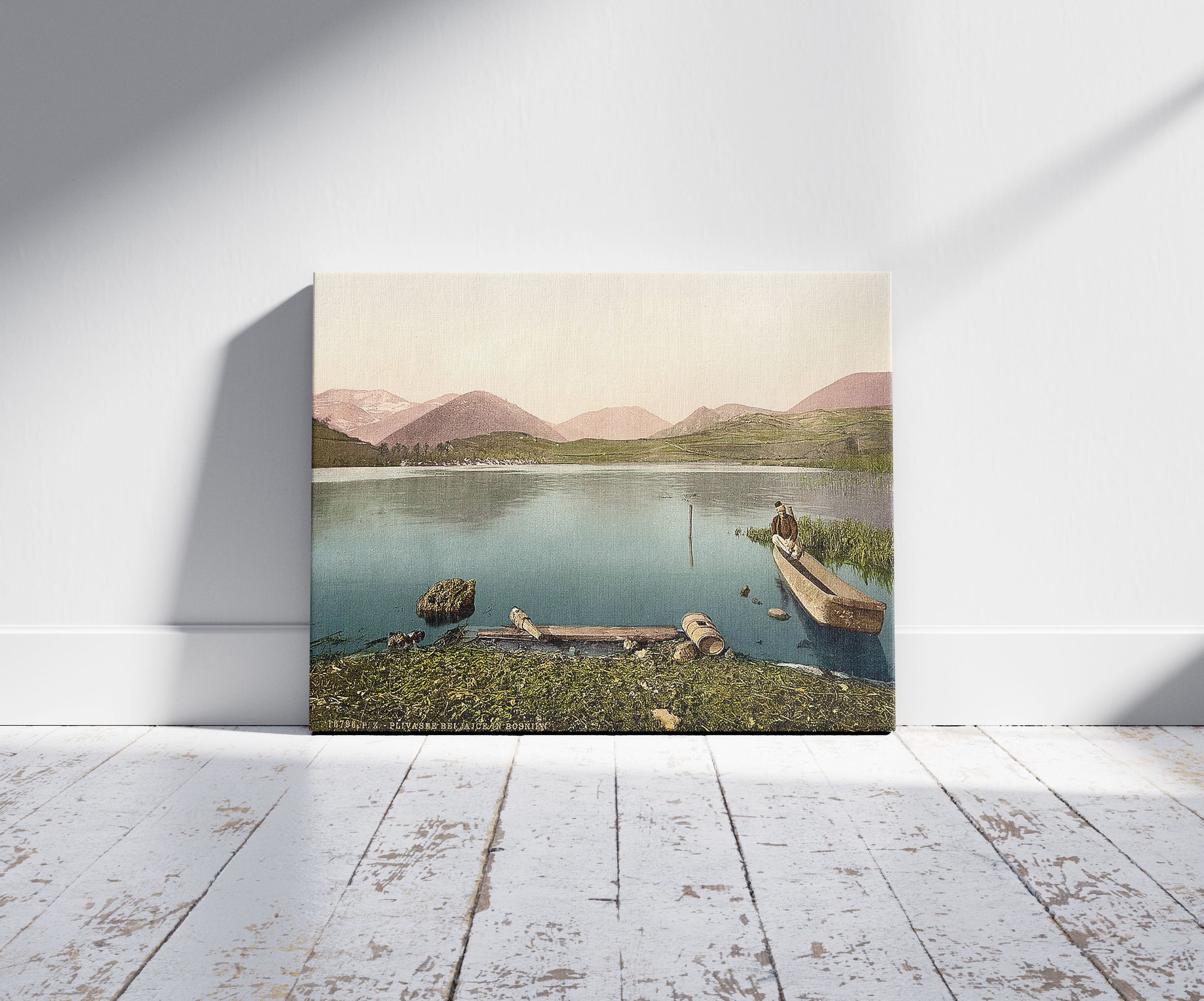 A picture of Jajce, Pliva Lake, Bosnia, Austro-Hungary, a mockup of the print leaning against a wall
