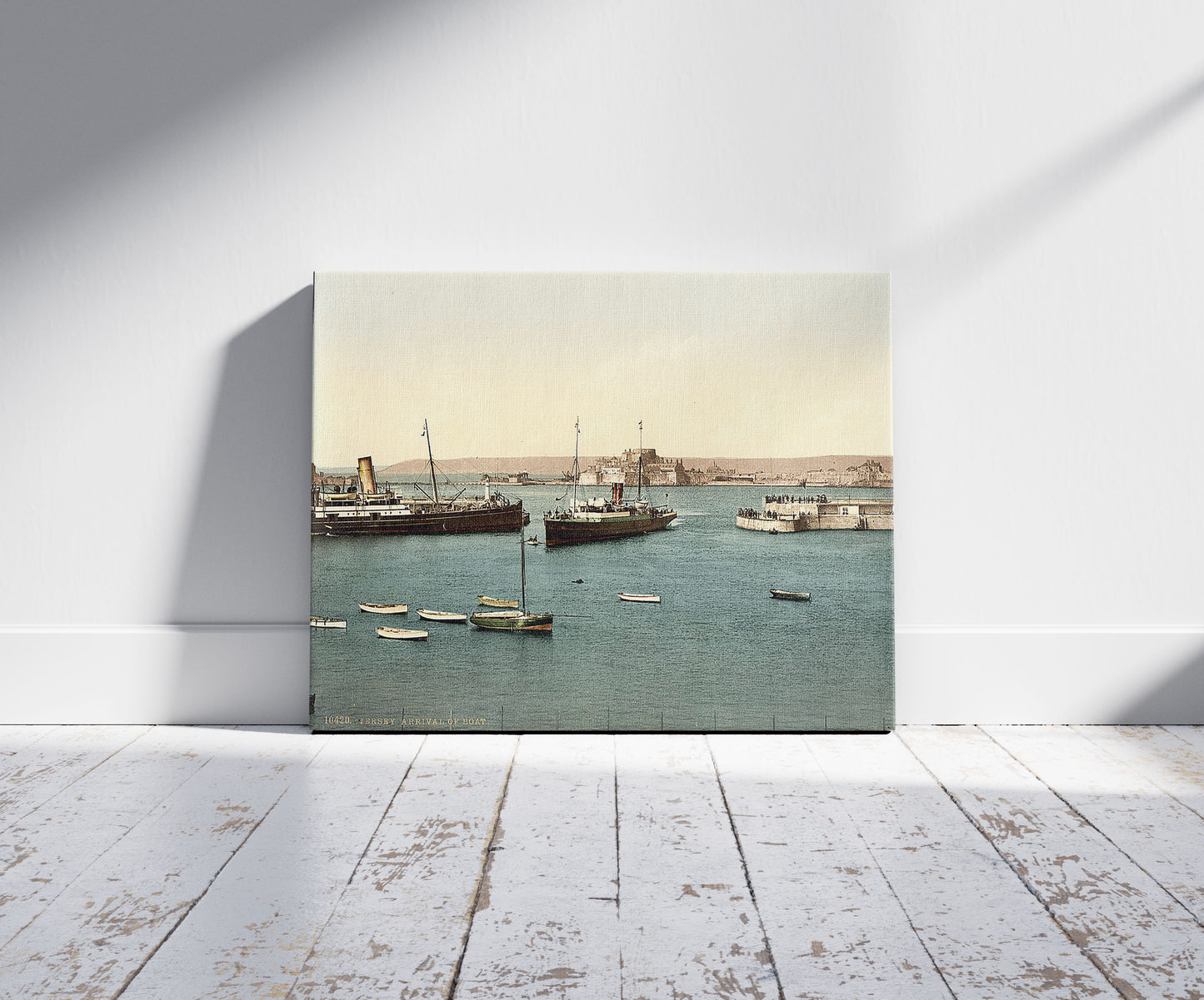 A picture of Jersey, arrival of boats, St. Helier, Channel Islands, a mockup of the print leaning against a wall