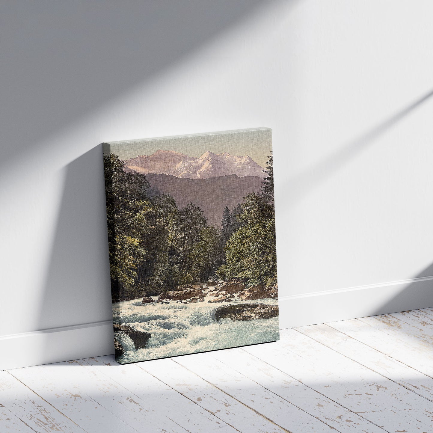 A picture of Jungfrau and Lutschine, Bernese Oberland, Switzerland, a mockup of the print leaning against a wall